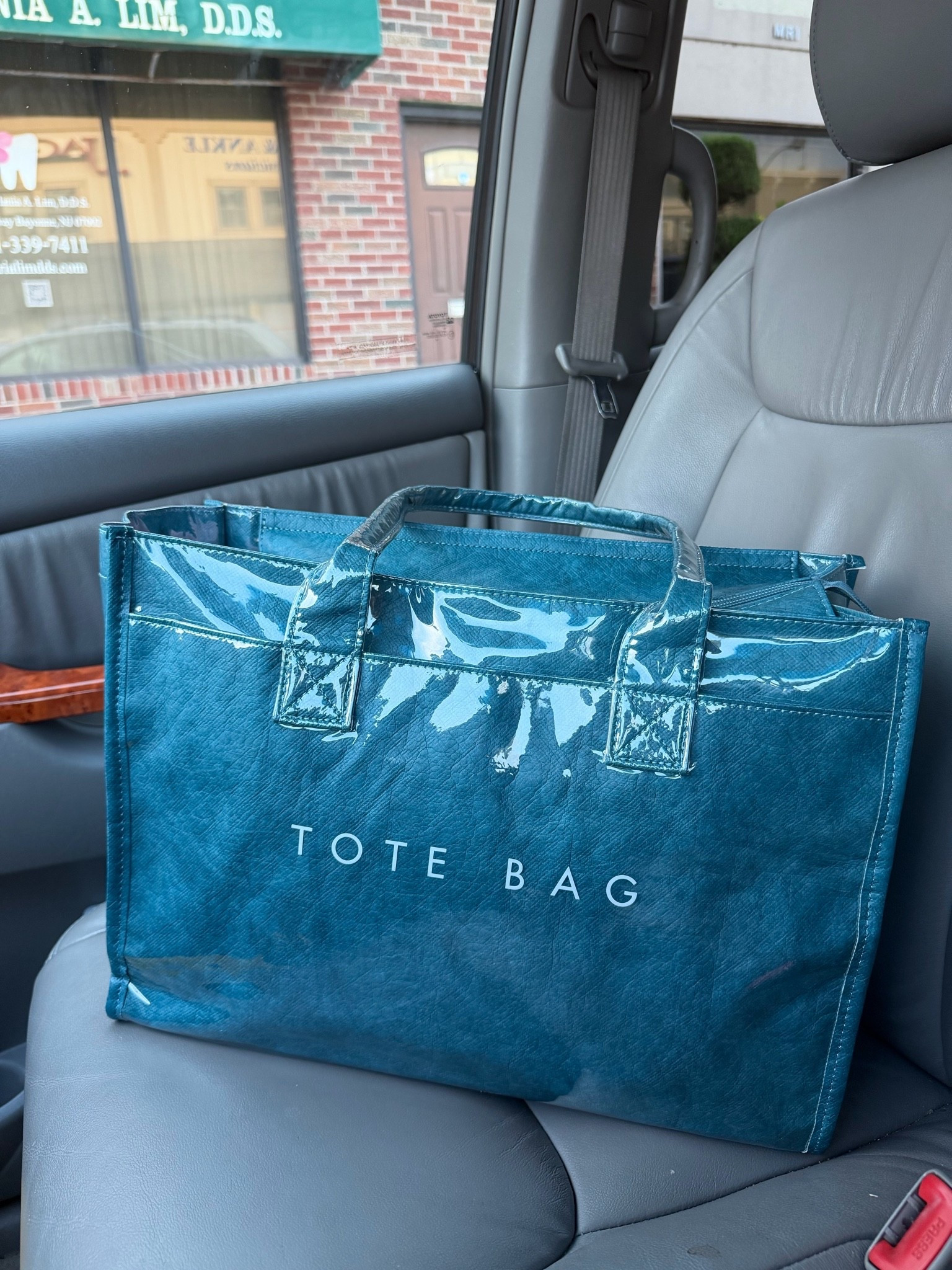 With diaper bag tote with zipper for under $30!