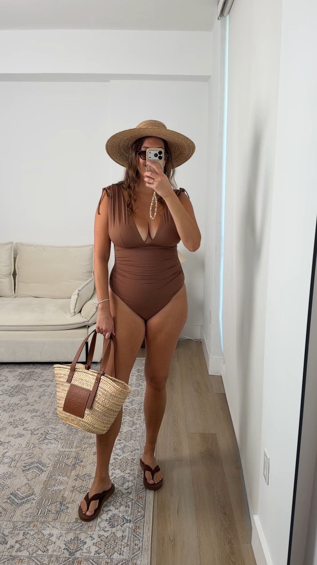 This one-piece is doing all the work 🤍
The rich brown color is so flattering, the ruching is forgiving in the best way, and the neckline gives just enough shape without feeling overdone. Easy to dress up with a straw hat + tote or wear straight to the pool.

Linked here 🏝️

Keywords:
brown one piece swimsuit | flattering one piece | ruched swimsuit | neutral swimwear | resort swim style | vacation swimsuit | mom friendly swim | classic swimwear | beach outfit essentials | summer swim look

#LTKTall #LTKTravel #LTKMidsize