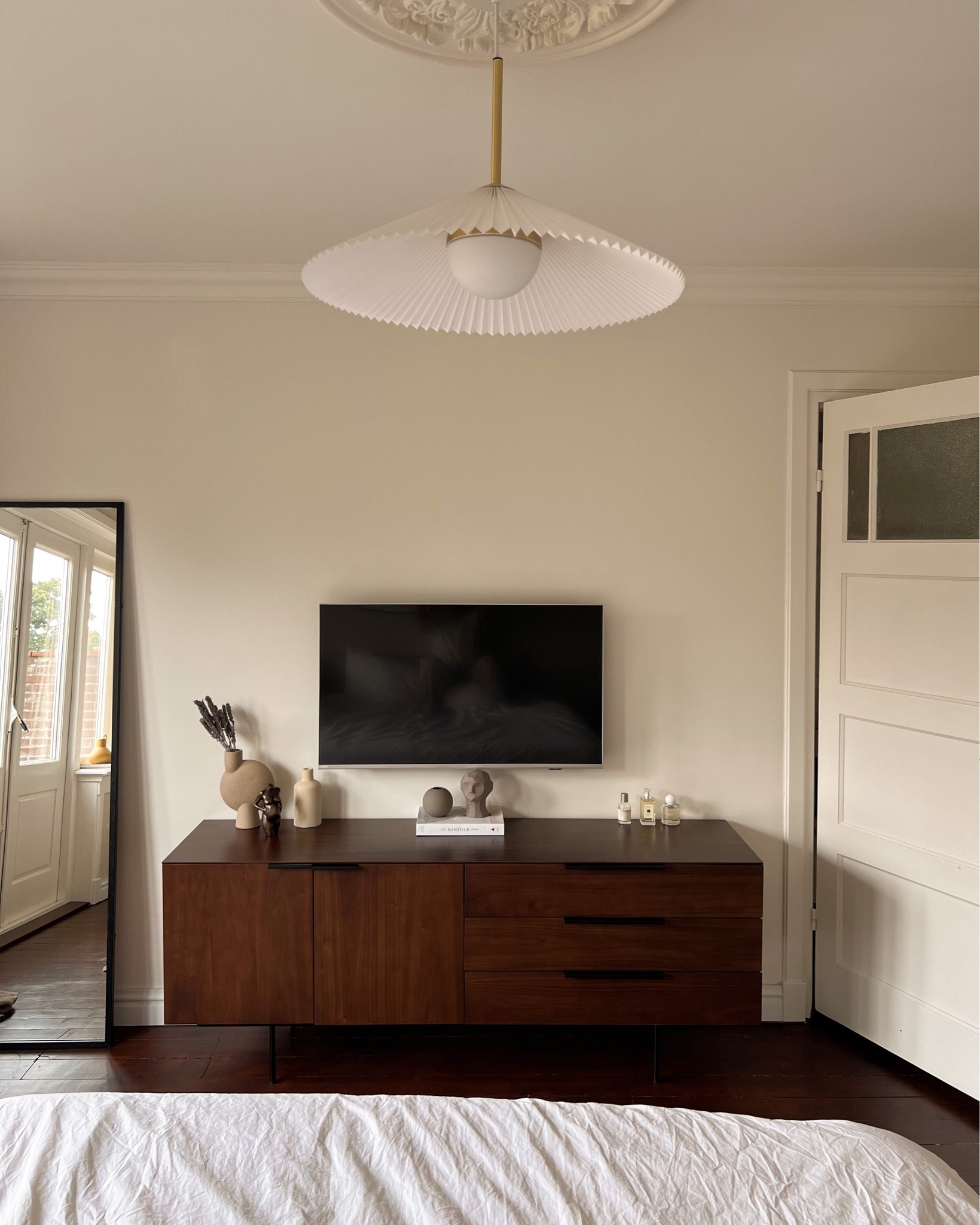 The tv area in our bedroom. Modern with a classic twist.

#LTKeurope #LTKhome