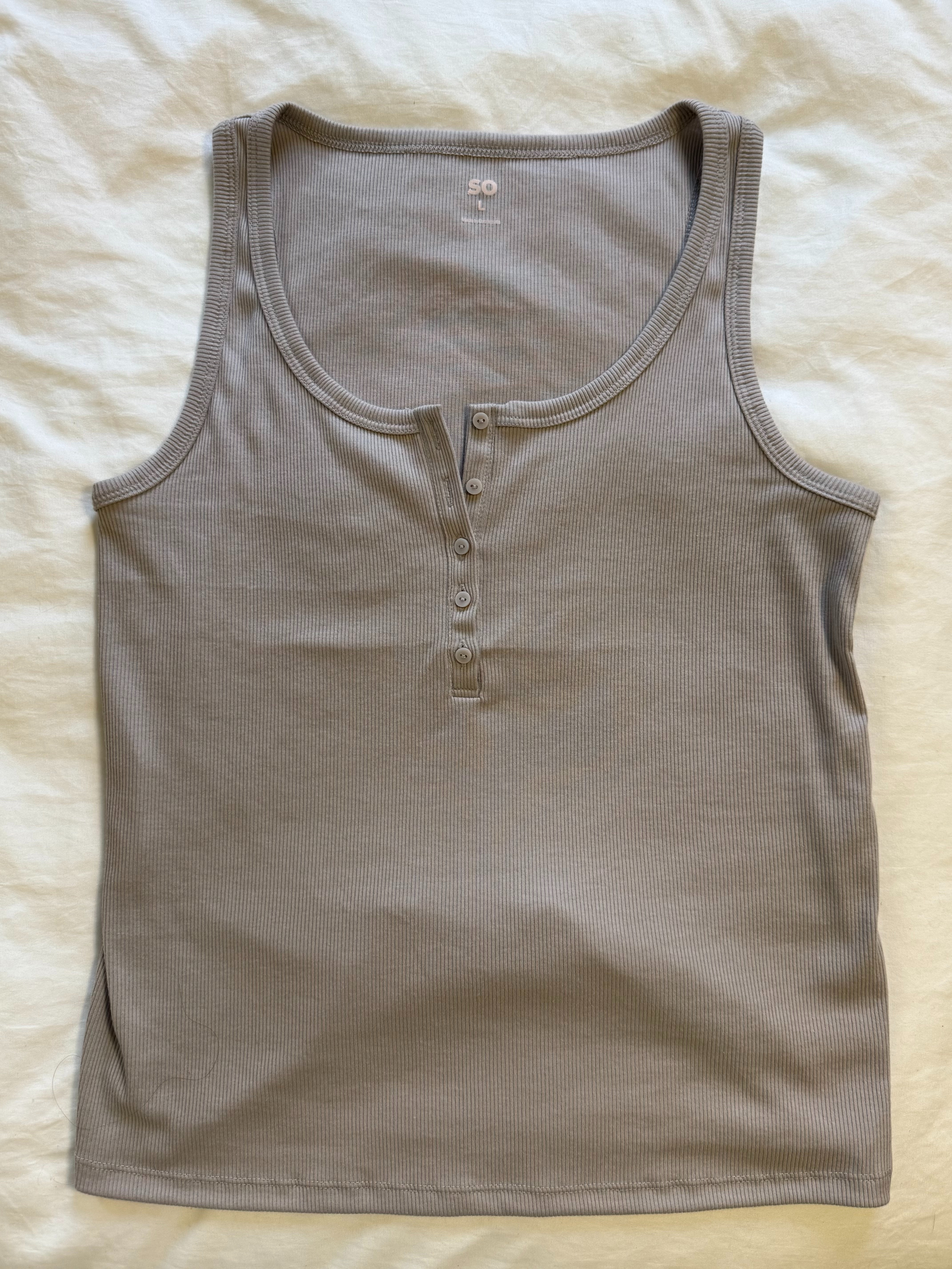 STOP. These tanks are THAT good. 😍

I'm ordering my THIRD color today. The fit is so flattering, they're super soft, and the little Henley detail makes them look way more expensive than $9.99.

The best part? It's Kohl's Deal Days right now (basically their Prime Day competition 👀), so shipping is FREE with no minimum.

And if you have $5 Kohl's Cash sitting in your account, this tank ends up around $4.99. 🙌

Don't blame me when you end up with three too. 😂

Kohl's • SO Ribbed Henley Tank • summer basics • ribbed tank • affordable fashion • layering piece • capsule wardrobe • everyday outfits • Kohl's Deal Days • free shipping 

 #LTKOver40 #LTKSaleAlert #LTKMidsize