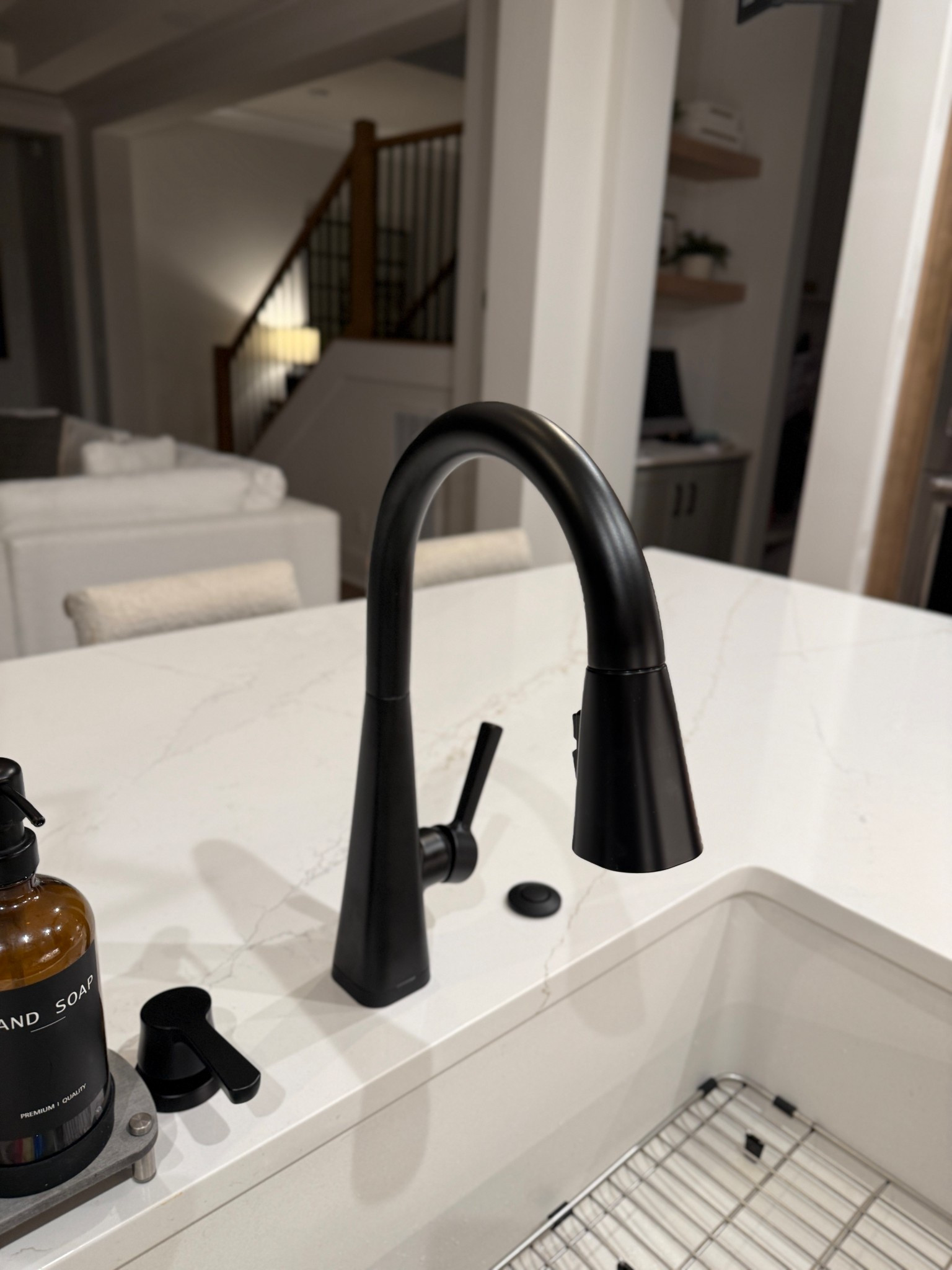Hands-free & hassle-free! Loving this sleek touchless faucet from @wayfair — a modern upgrade that adds style and smarts to our kitchen. We had this at our last house and loved it. When we moved into our new house we were constantly touching it to turn it on. We missed it so much! So we finally switched it out. 
#ad #wayfair #wayfairpartner 

