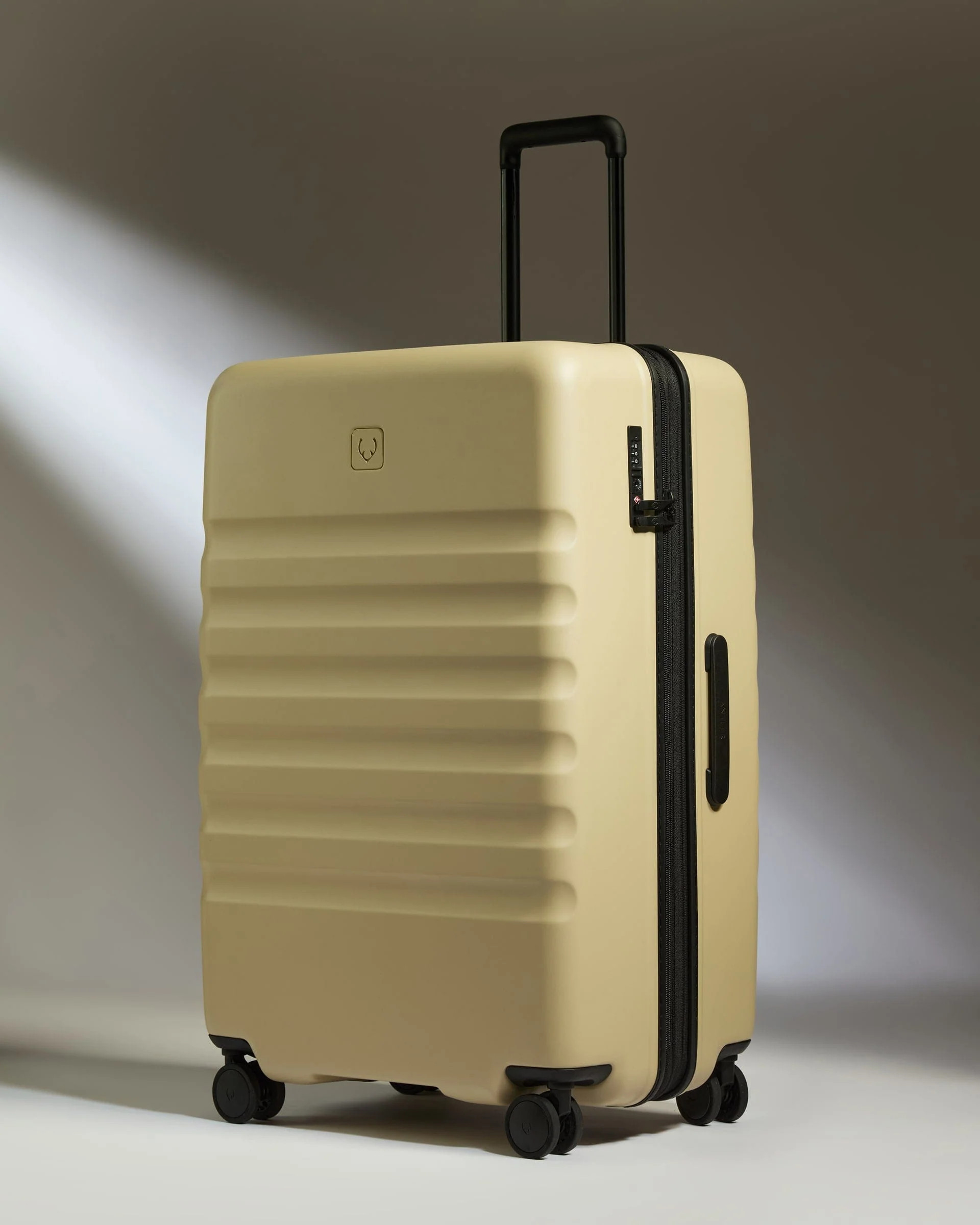Icon Stripe Large Suitcase in Yellow | Lightweight & Hard Shell Suitcase | Antler UK