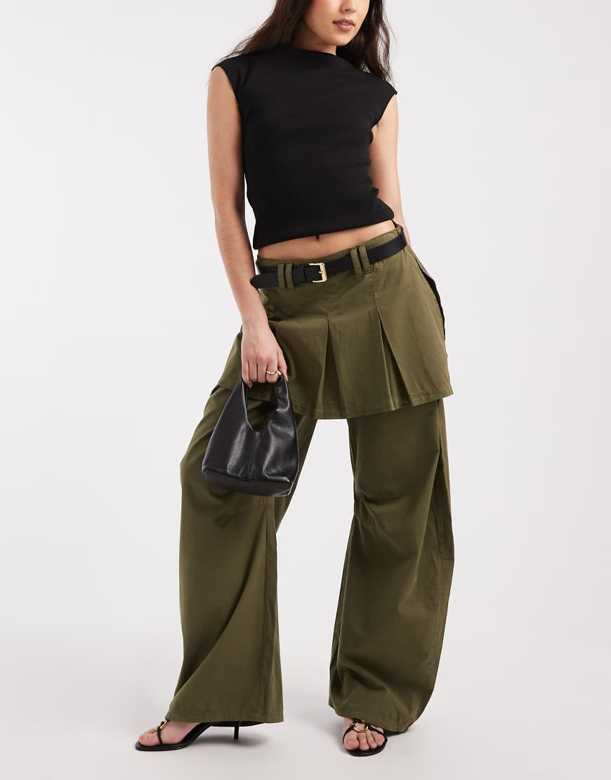 ASOS DESIGN barrel leg pants with pleated skirt overlay in dark green | ASOS (Global)