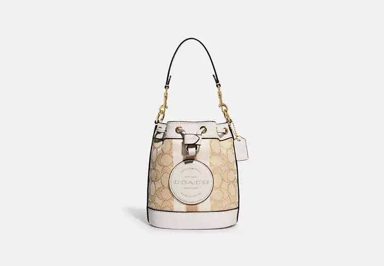 Coach Outlet Mini Dempsey Bucket Bag In Signature Jacquard With Stripe And Coach Patch - White | Coach Outlet US