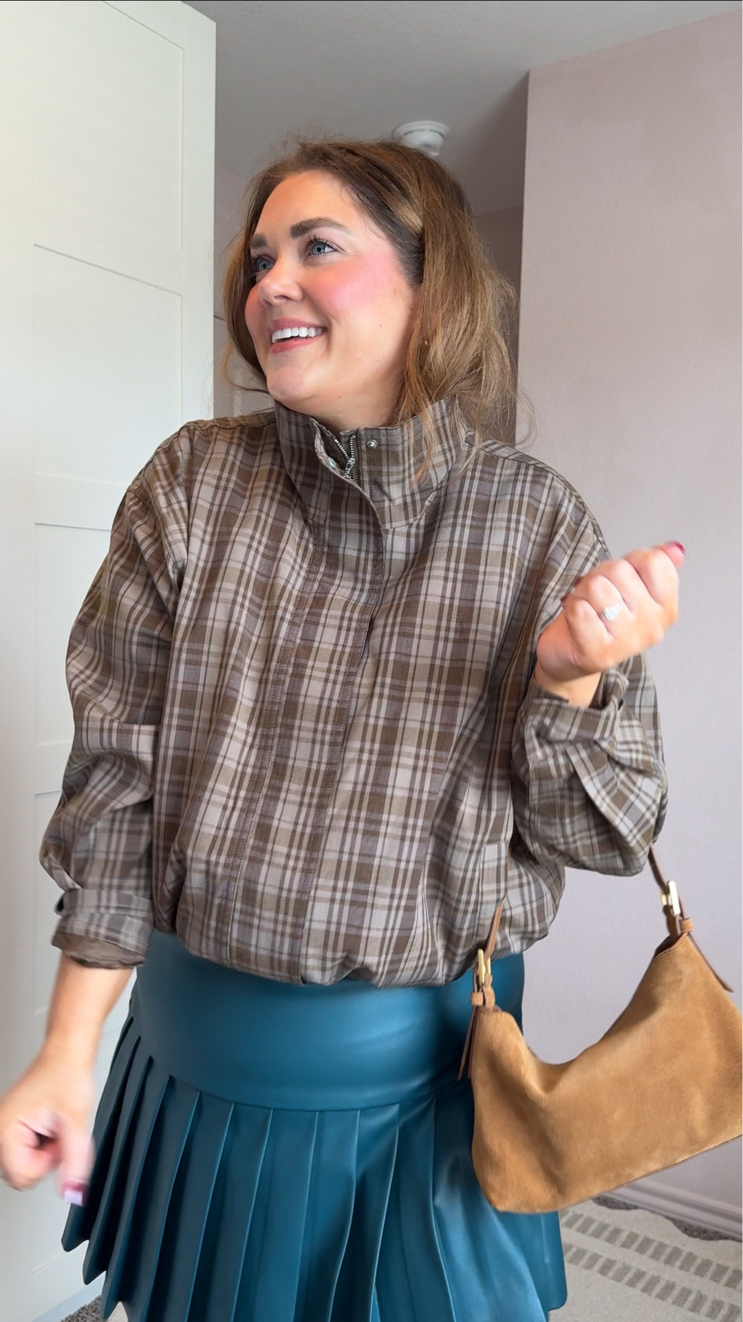 Fall hottie outfit wearing size 14 in leather pleated skirt and large in jacket. Added plus size lookalikes if needed! The xl jacket fits a 16-18. Favorite fall flats on sale. Xl in white tank.

#LTKMidsize #LTKgrwm #LTKootd