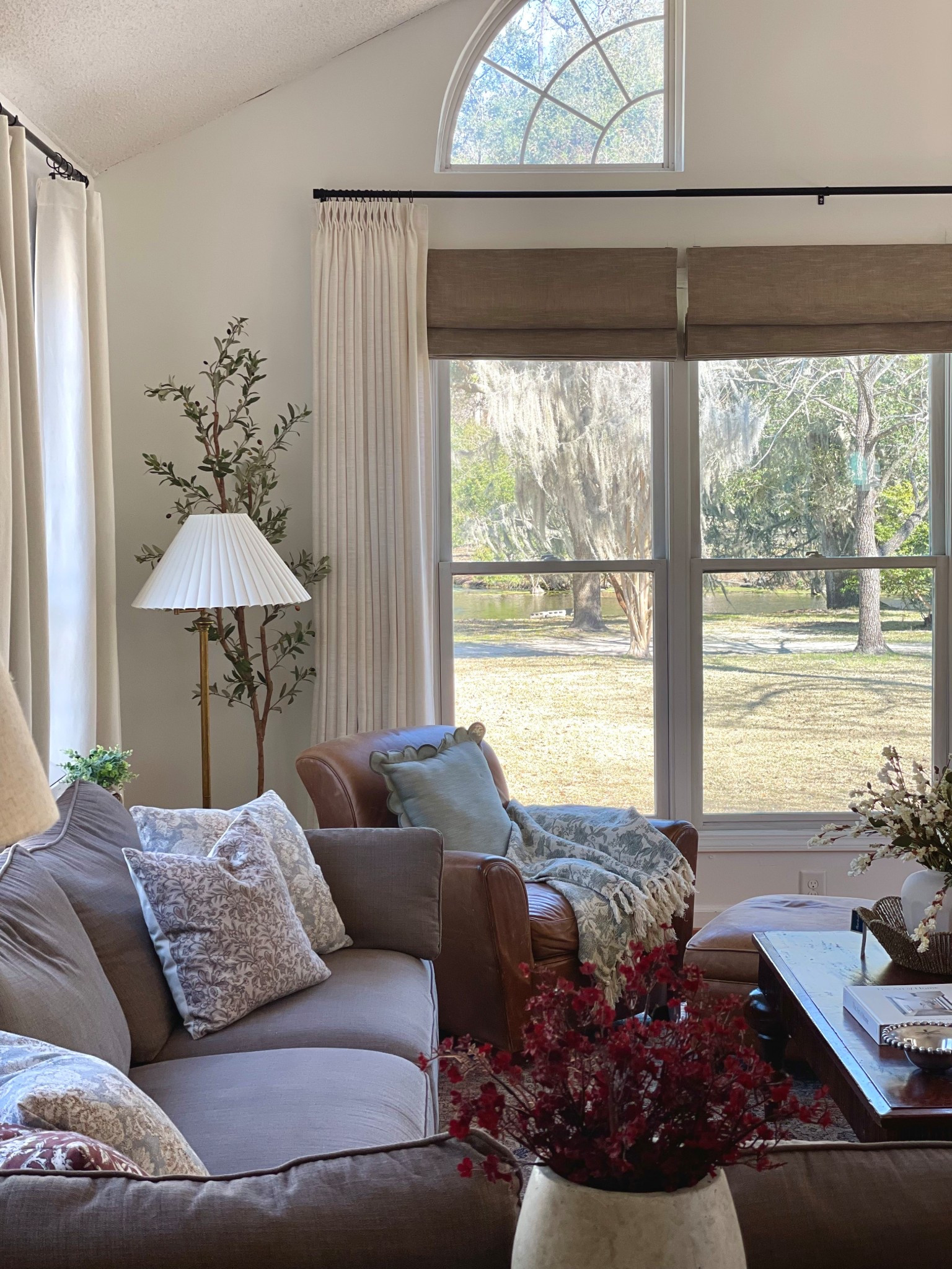 Details:
Curtains: Liz Linen in Ivory White 1908-2, Triple Pleat, Memory Shaped, Room Darkening 70%

Roman Shades: Jawara Cordless in Gray, Outside Mount, Room Darkening 75%

#twopageshome #twopagescurtains #romanshades #windowtreatments #livingroomdecor #cozyhome #traditionalhomedecor #spring 

#LTKStyleTip #LTKHome #LTKWatchNow