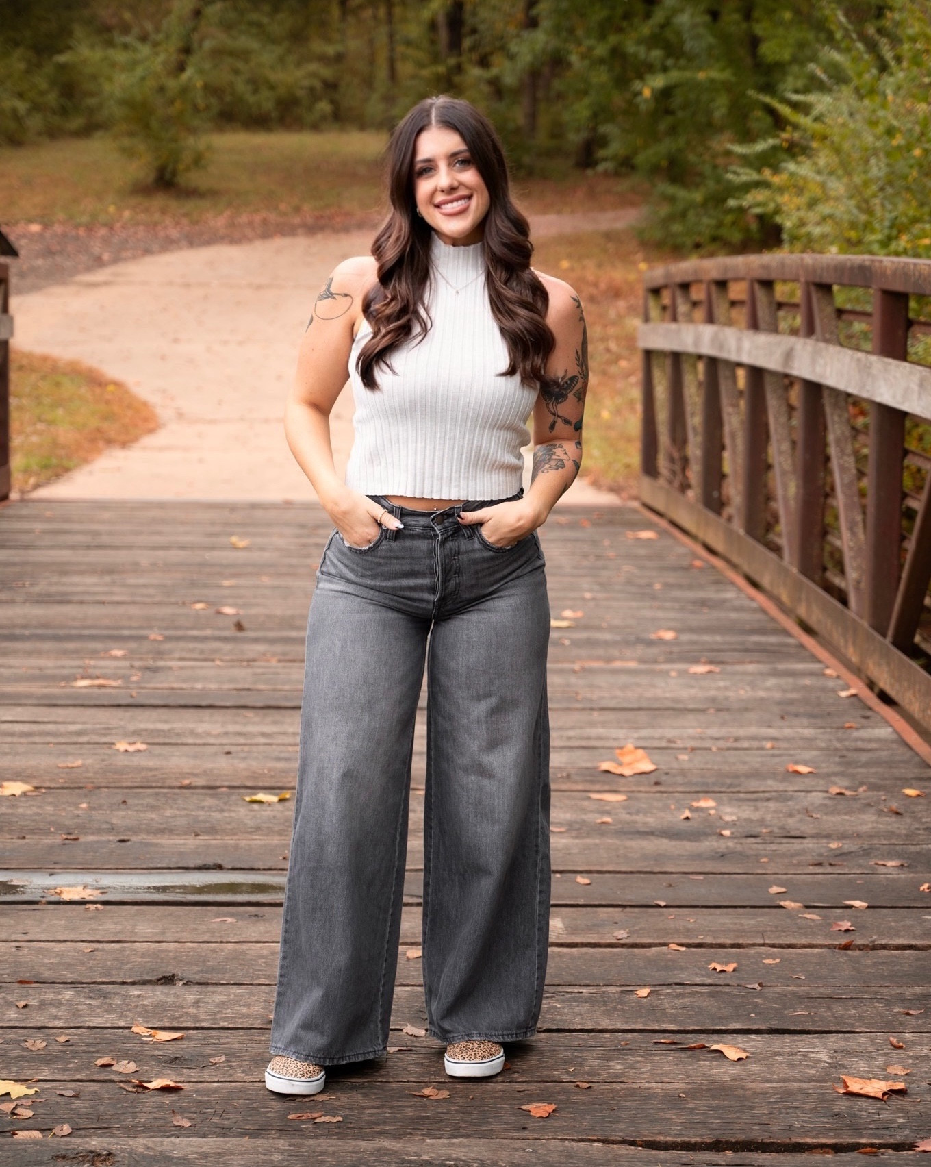 I am wearing jeans size 6
oatmeal sweater tank size xs for snug fit  

 