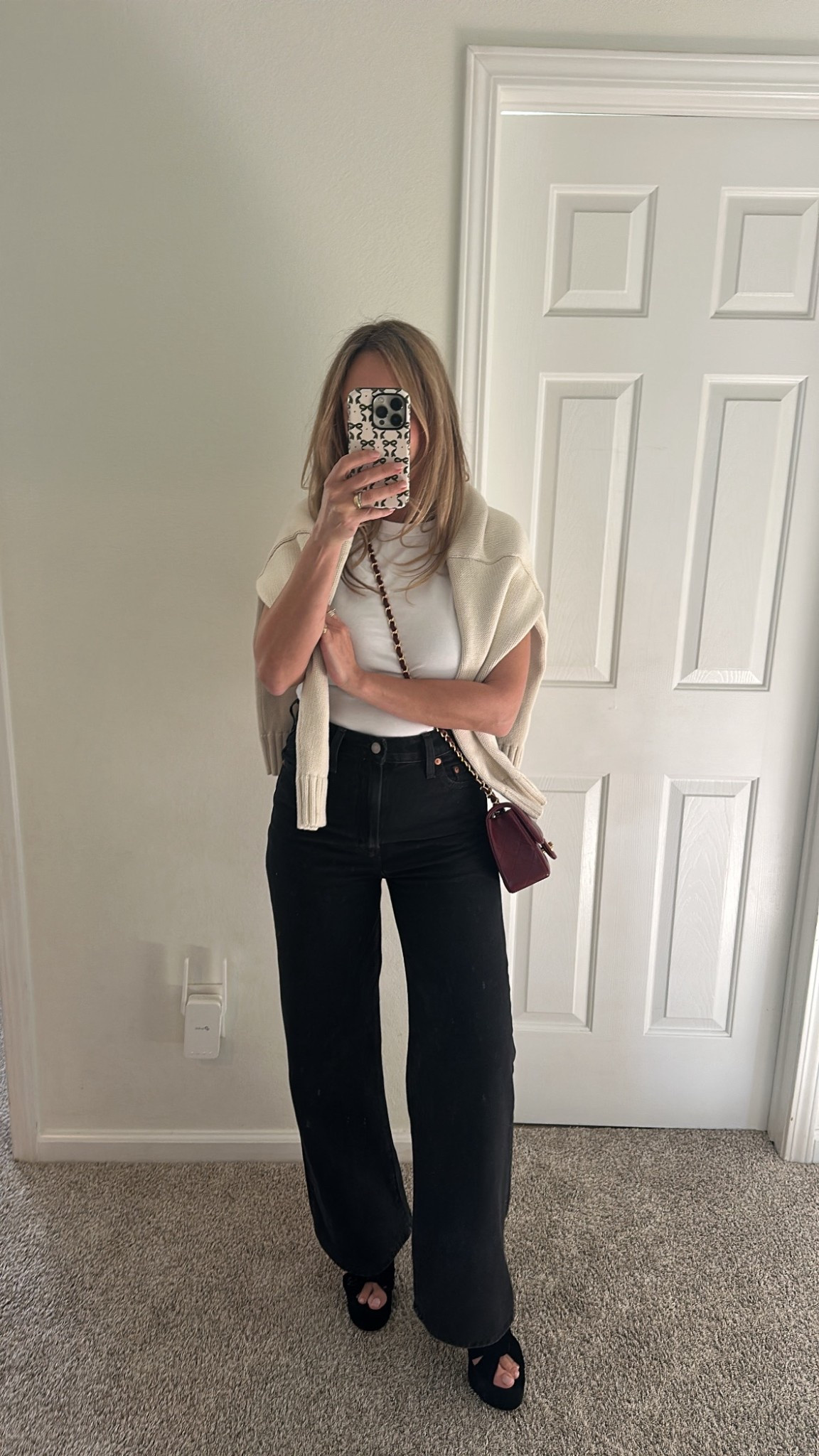 CBK 90s minimalist outfit for Soring, Levi jeans, white tee and cozy knit sweater 

#LTKSpringSale