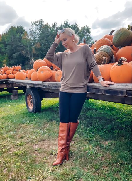 Pumpkin parachute outfit for when it’s not quite sweater weather. This dolman top is lighter than a sweater but still has all the fall feels  

#LTKover40 #LTKshoecrush #LTKSeasonal