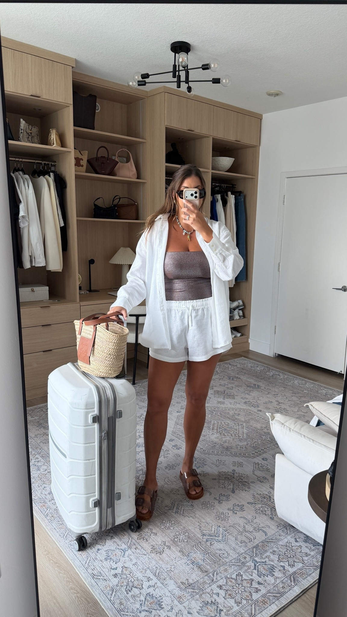 Airport style, but make it coastal chic.

airport outfit, travel outfit, vacation outfit, resort wear, linen button down, white linen shorts, tube top, strapless top, birkenstock sandals, woven tote, beach vacation, summer travel style, coastal style, effortless outfit, neutral outfit, carry on outfit, weekend getaway, casual chic, vacation essentials, lightweight layers, summer fashion, travel day look, capsule wardrobe, vacation packing, resort outfit

#LTKTravel #LTKMidsize #LTKSeasonal