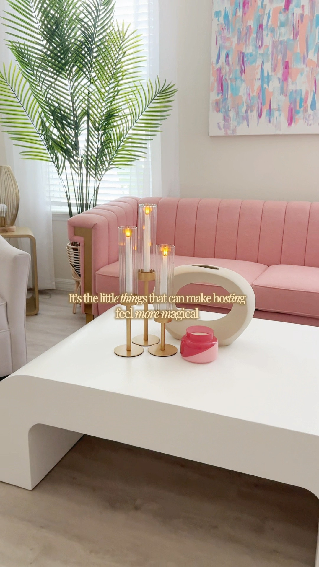 Battery operated candles with fluted gold hurricane candle holders on my favorite curved coffee table by our pink sofa 💕


#LTKHome
