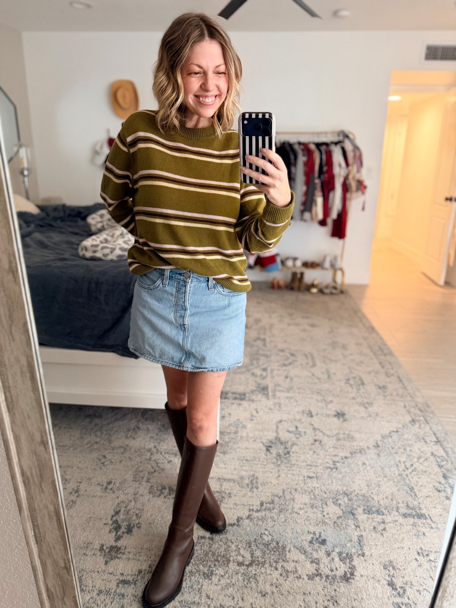 A fall look I’ll be wearing on repeat. 
Sweater is oversized I got an xs. 
Skirt is a 27 (could’ve done a 26). 
Boots are a 6(tts). 
@reformation

#LTKOver40 #LTKootd #LTKPetite