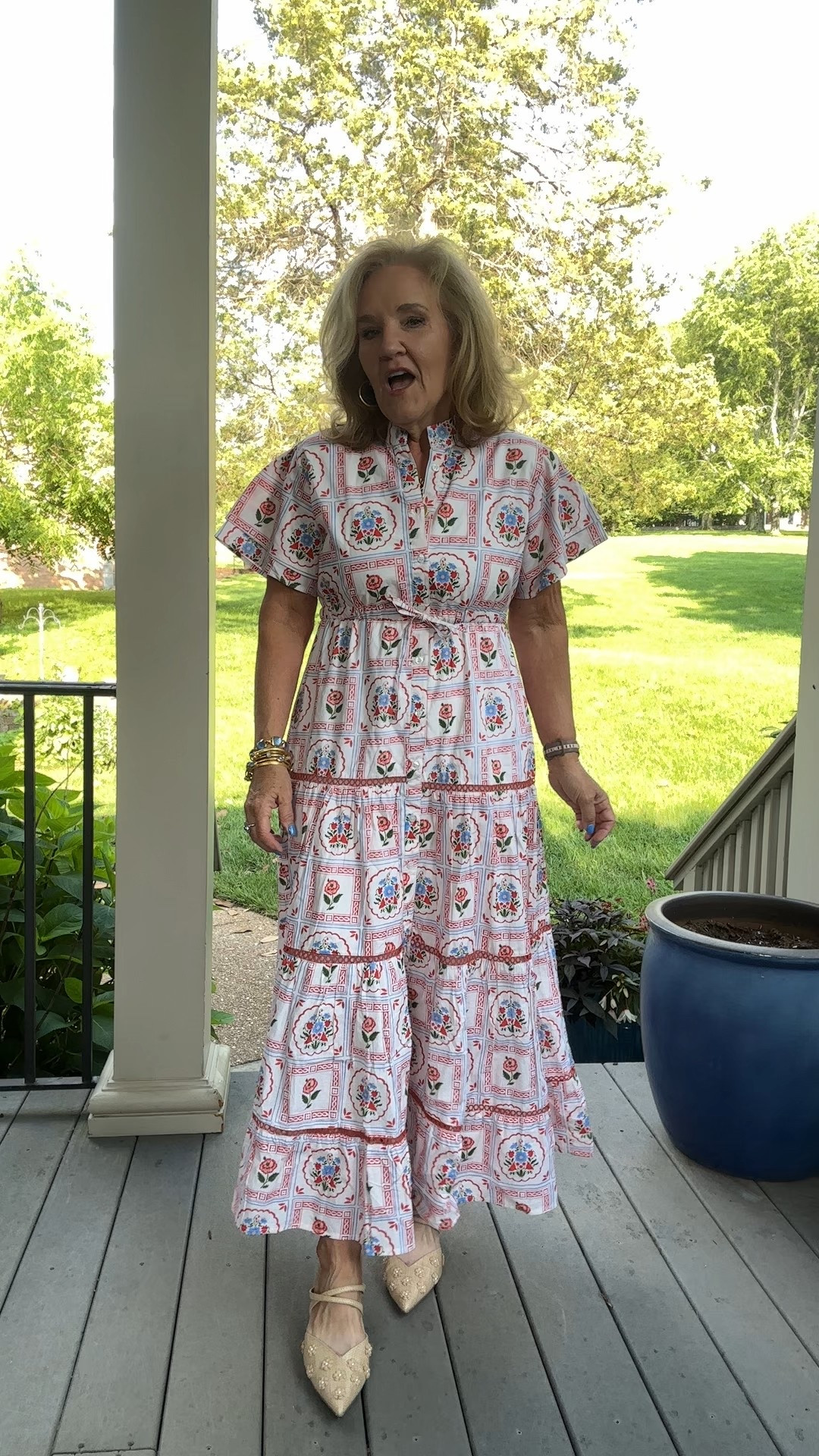 This print is beautiful! Wear it to Italy, to the 4th of July picnic, to a neighborhood bbq and a backyard wedding. 

The picture on her website model is not accurate. Scroll to see her print in the second photo on her site. And my photo is very accurate. It’s like evergreen, tomatoe red and periwinkle blue  

I’m wearing a medium. This dress is true to size. 