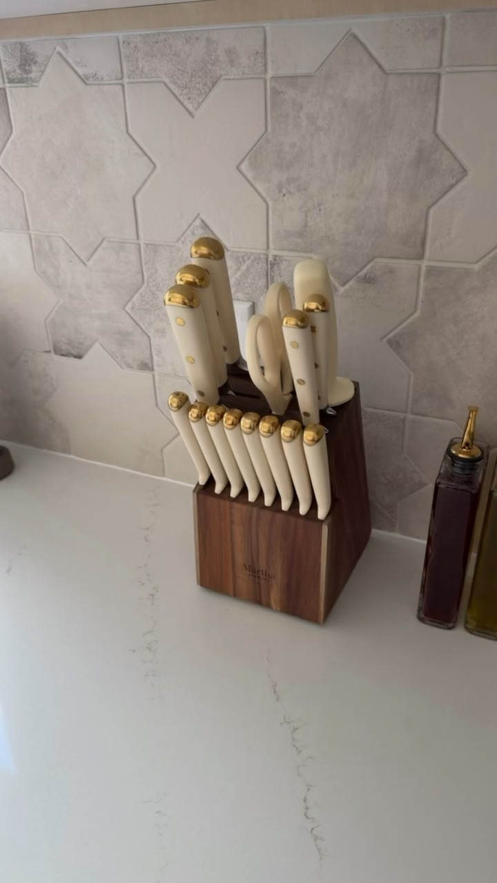 Martha Stewart wooden & cream/gold knife block set from Amazon is the perfect counter piece display for our Airbnb. 

#Amazonhome