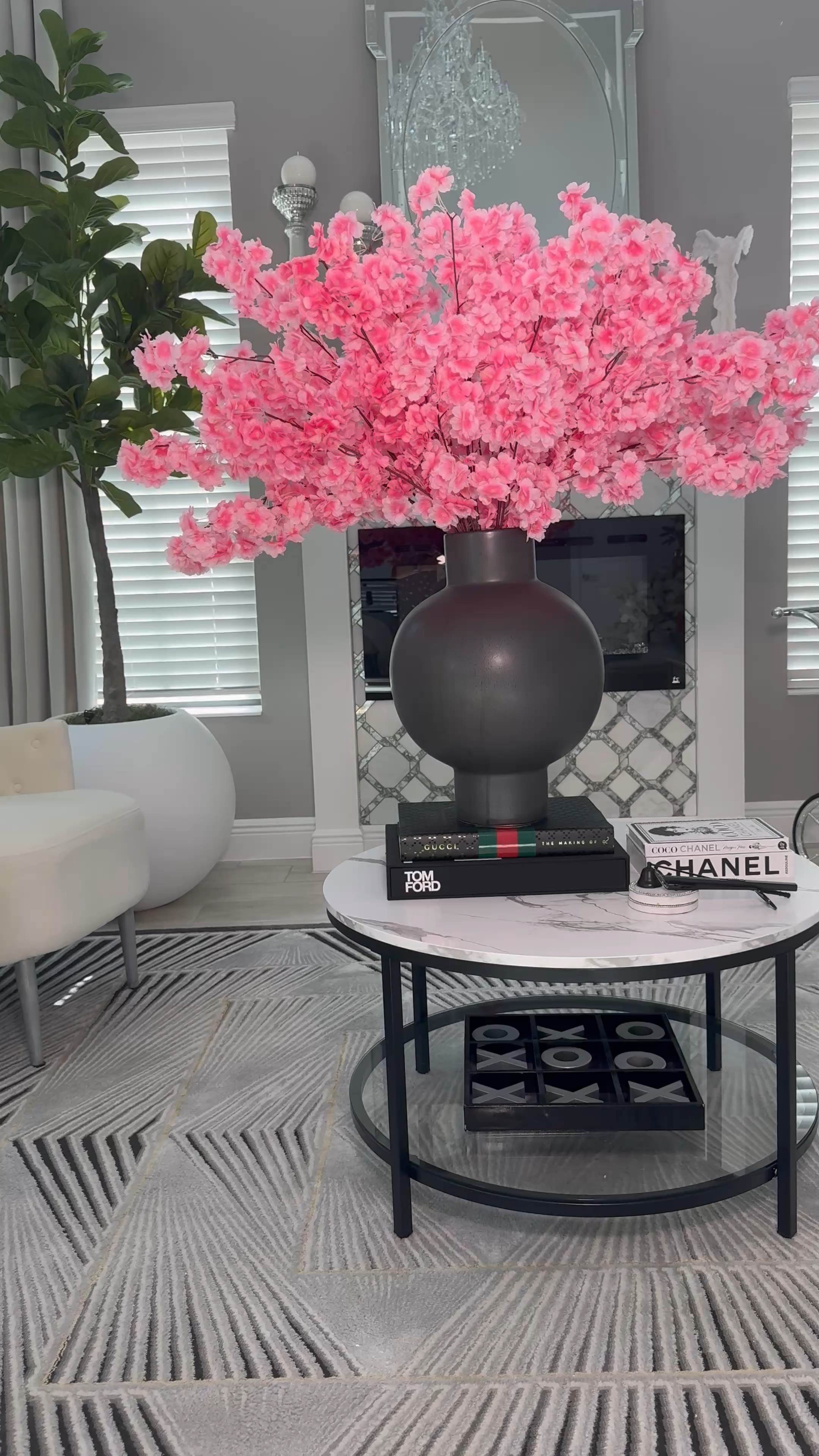 ✨Living Room Goals ✨
Obsessed with how these cherry blossom florals instantly elevated my space 🌸 Paired with luxe coffee table books and glam decor touches to bring it all together. Modern, bold, and oh-so-stylish!

💕Tap to shop every detail from the statement vase to the Tom Ford + Chanel book stack! 

 #LTKSeasonal #LTKActive #LTKHome