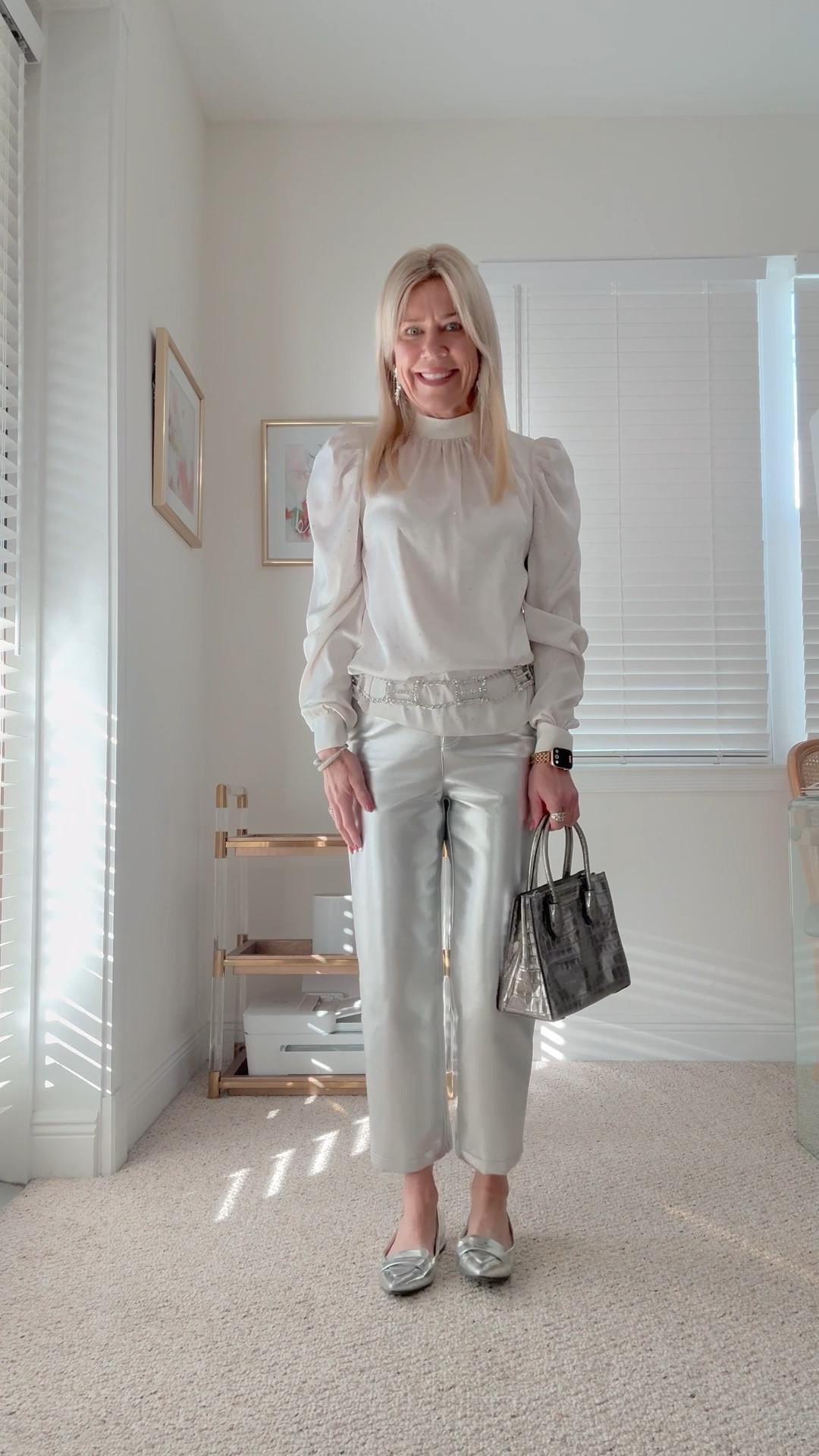 The sparkle of this outfit and the metallic shine through making a style statement. Worn to an entrepreneurs meeting and everyone asked me about the look. Silver metallic faux leather cropped ants with an ivory crystal embellished blouse + vintage crystal belt and silver loafers. Pants wearing XS, blouse size small. Both fit true to size.

#LTKPetite #LTKStyleTip #LTKOver40