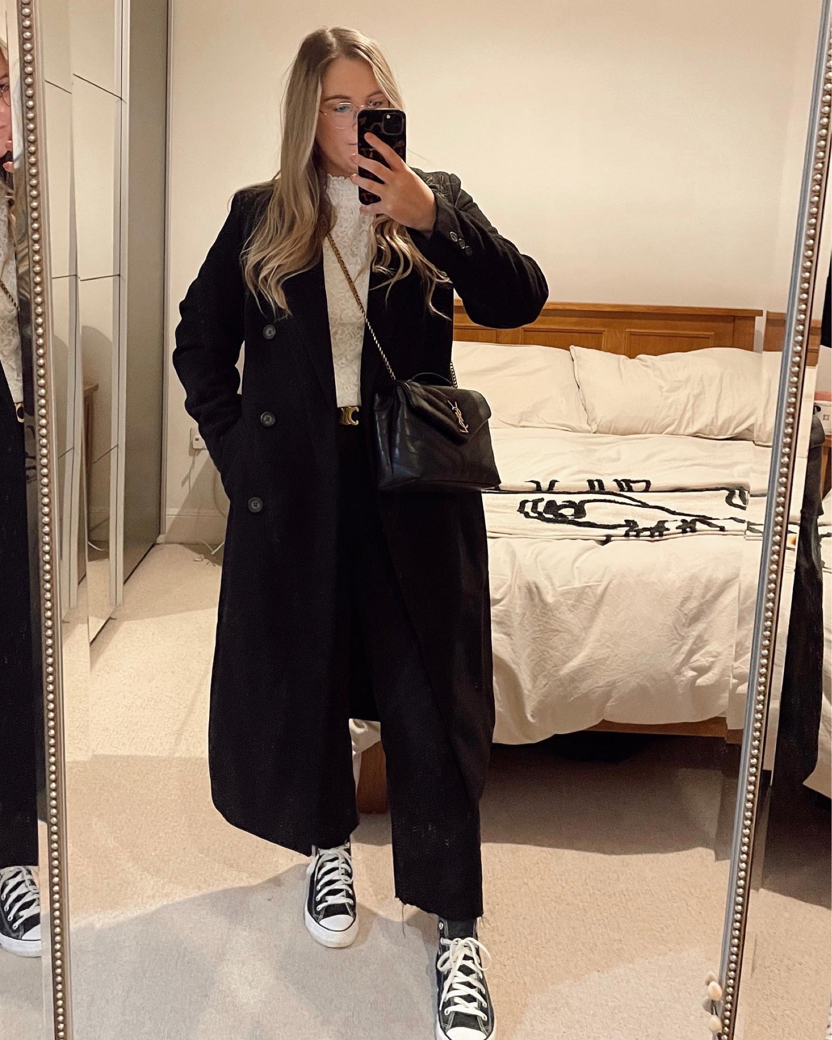 All back minimal outfit winter style H&M long black coat with converse 

#LTKeurope #LTKunder50 #LTKFind