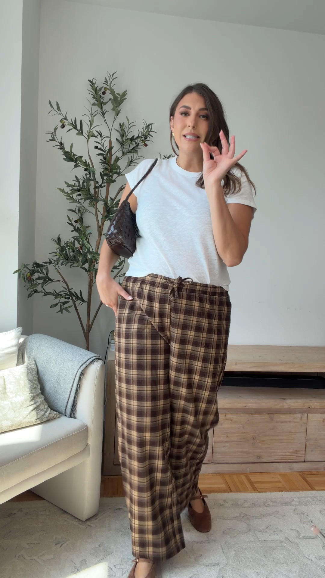 Plaid pants are having a moment, and this cozy wide-leg pair is the cutest fall find 🤎 Styled with a simple white tee, ballet flats, and a chocolate brown bag.

plaid pants outfit, fall fashion, casual fall outfit, wide leg pants, size large outfit, size 14 style

#LTKootd #LTKSeasonal #LTKMidsize