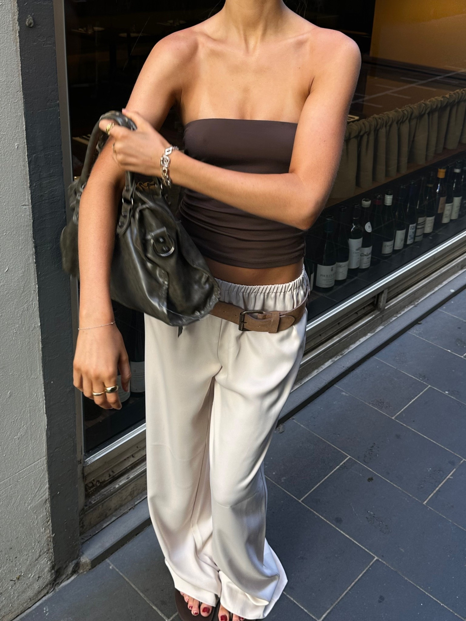 Silk white satin cream pants, strapless brown bandeau, vintage bag outfit, city bag brown, cool girl style, Pinterest fashion inspiration 

#LTKstyletip #LTKaustralia #LTKworkwear