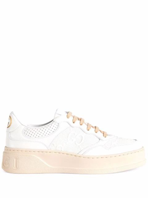GG embossed low-top sneakers | Farfetch (US)