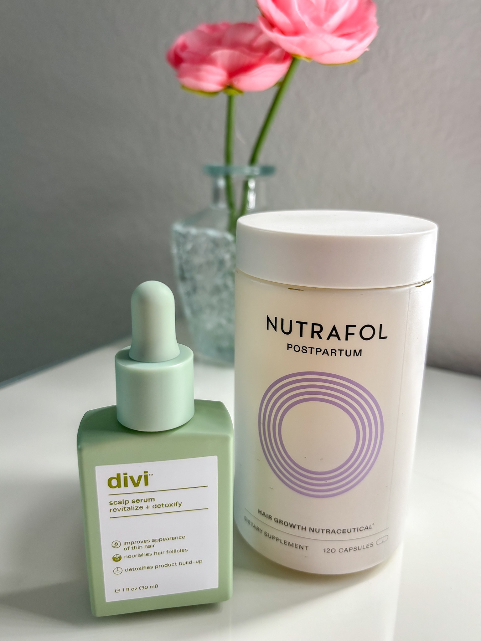 Postpartum hair growth essentials!!

Divi scalp serum 
Nurtafol postpartum hair vitamins 