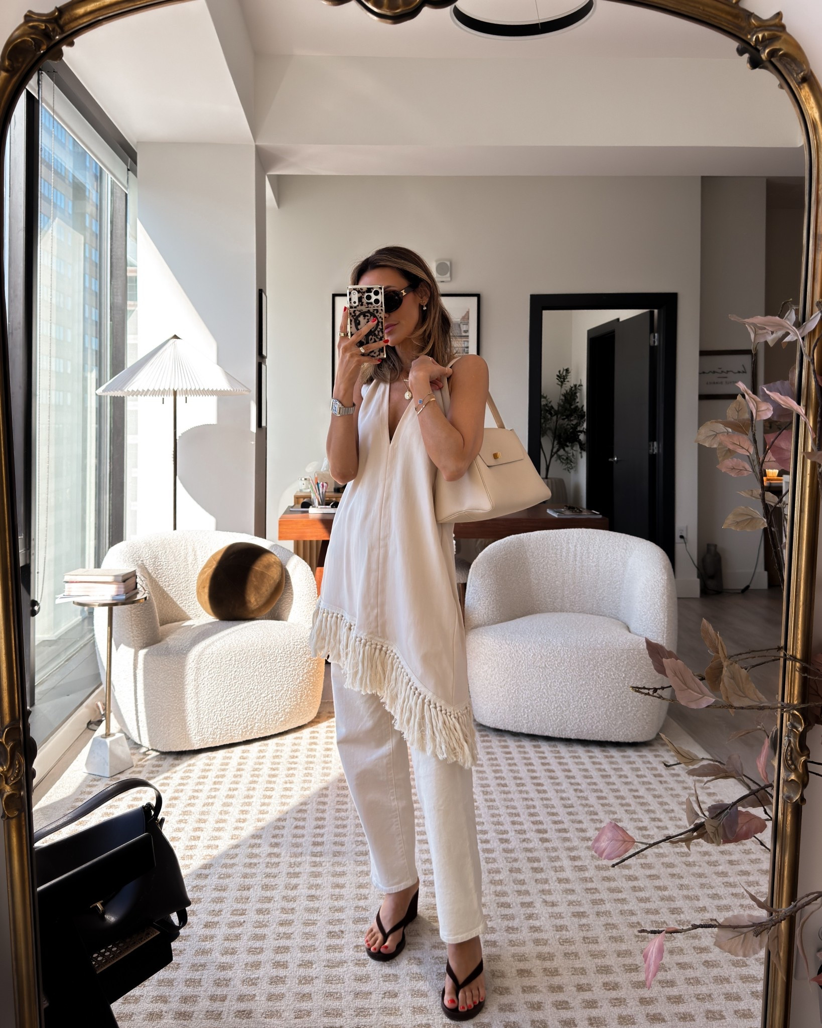 This tassel top is so pretty and long I ca totally wear it as a mini dress that is actually pretty long! Lauri v here with a cream trouser jean 

#LTKSeasonal #LTKootd #LTKOver40