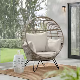 Tan Stationary Wicker Round Outdoor Lounge Egg Chair with CushionGuard Almond Biscotti Cushions | The Home Depot