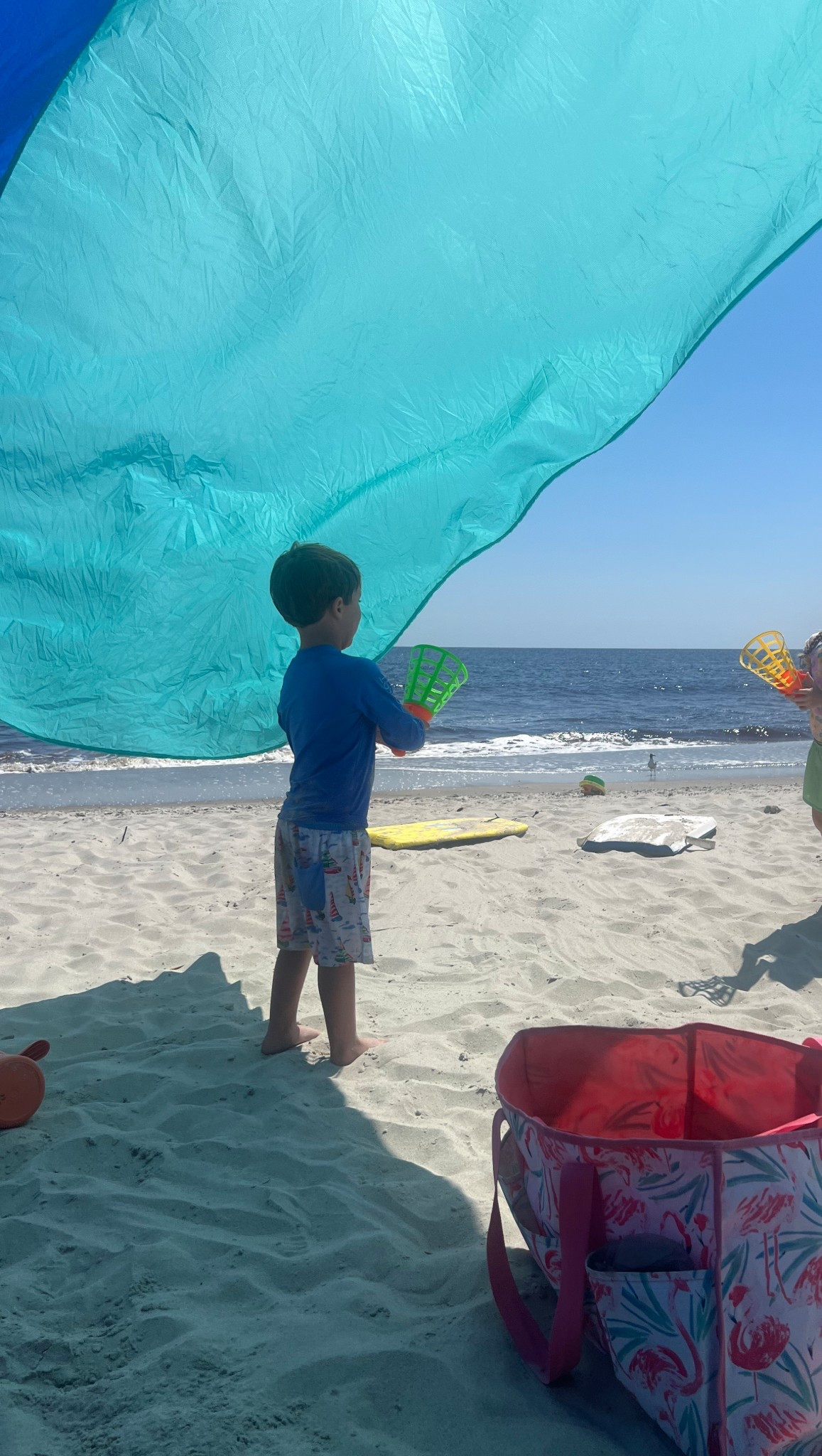 Our favorite beach shade is from #shibumi 🌊 easy set up and take down. Large area of shade too! We use it every summer! We have the classic in the basic blue combo. I’d love to get the pink/orange combo and some chairs next. 

#LTKTravel #LTKSeasonal