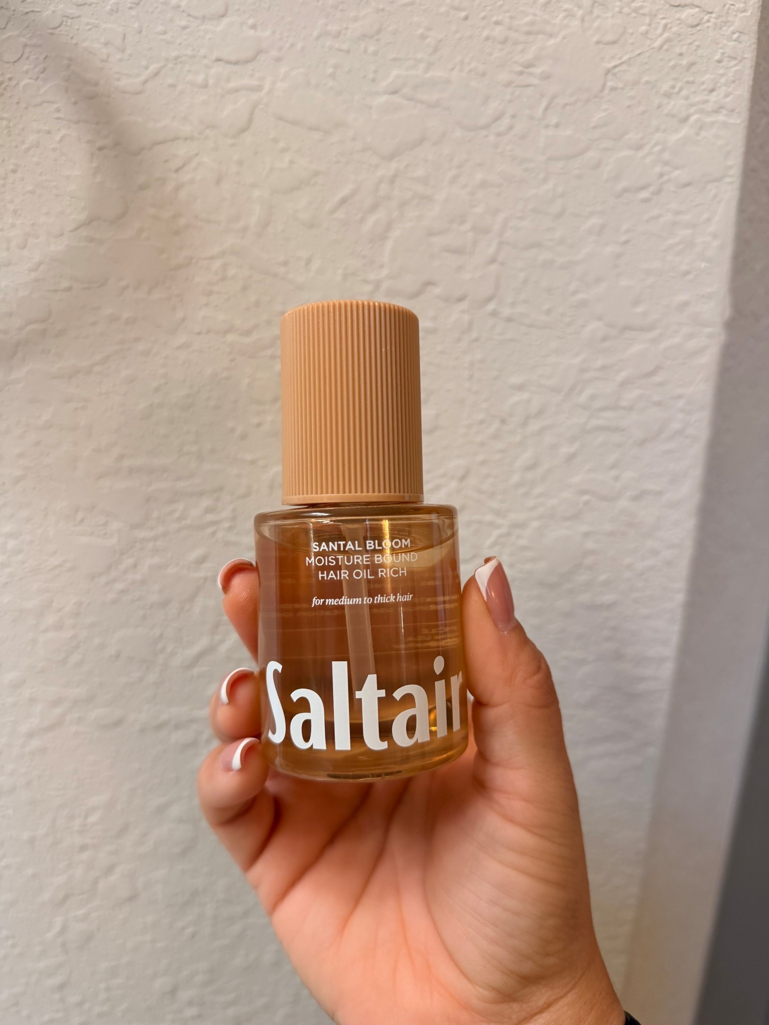 New hair product ✨ 
This stuff smells soooo good & it leaves my hair sooooo shiny and with no frizz !!! 

#LTKBeauty #LTKgrwm #LTKmorningroutine