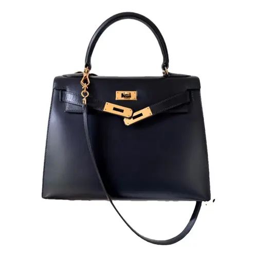 Kelly 28 leather handbag Hermès Black in Leather - 40664483 | Vestiaire Collective (Global)