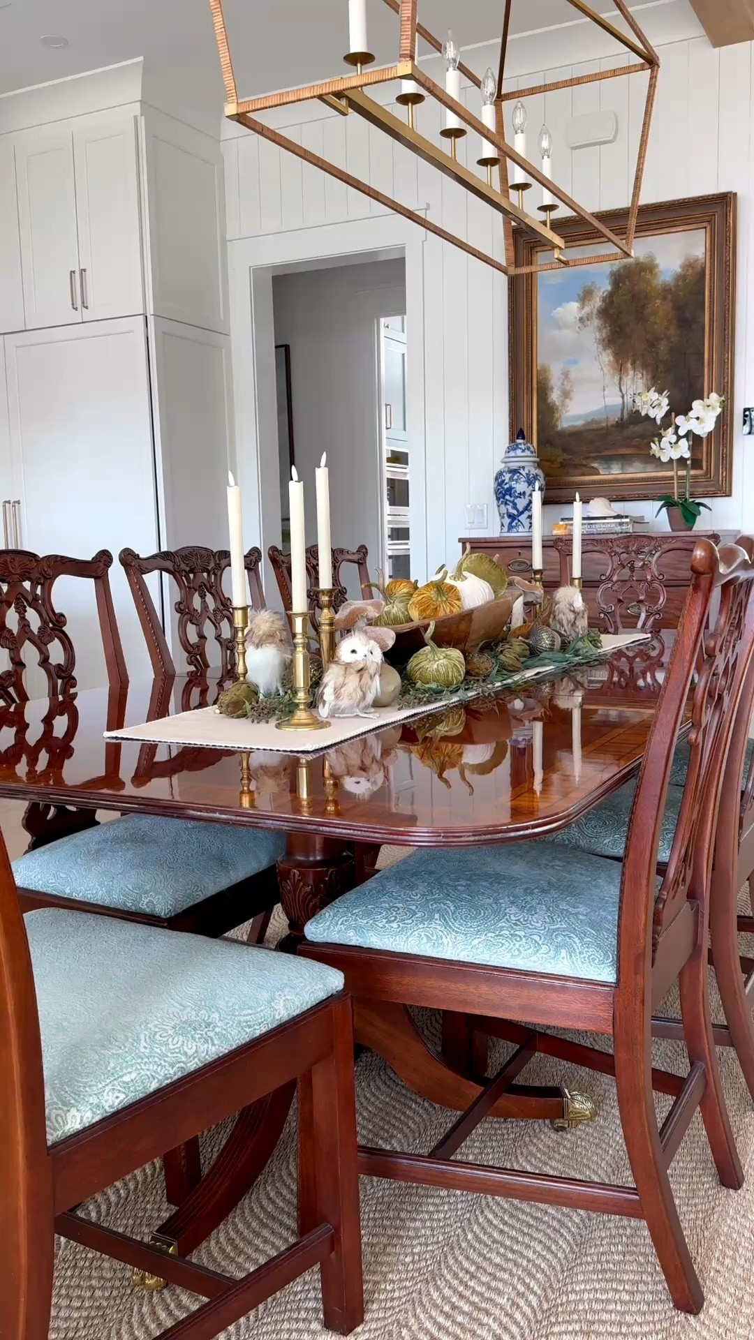 A collected woodland-inspired fall centerpiece with velvet pumpkins, leafy greenery, mushrooms, artichokes, acorns, and brass candlesticks gathered around a wood dough bowl. I’ve linked the same or similar pieces so you can create your own version. 🍂

I just sent it! The dough bowl is such a useful starting point for this look. 🍂
