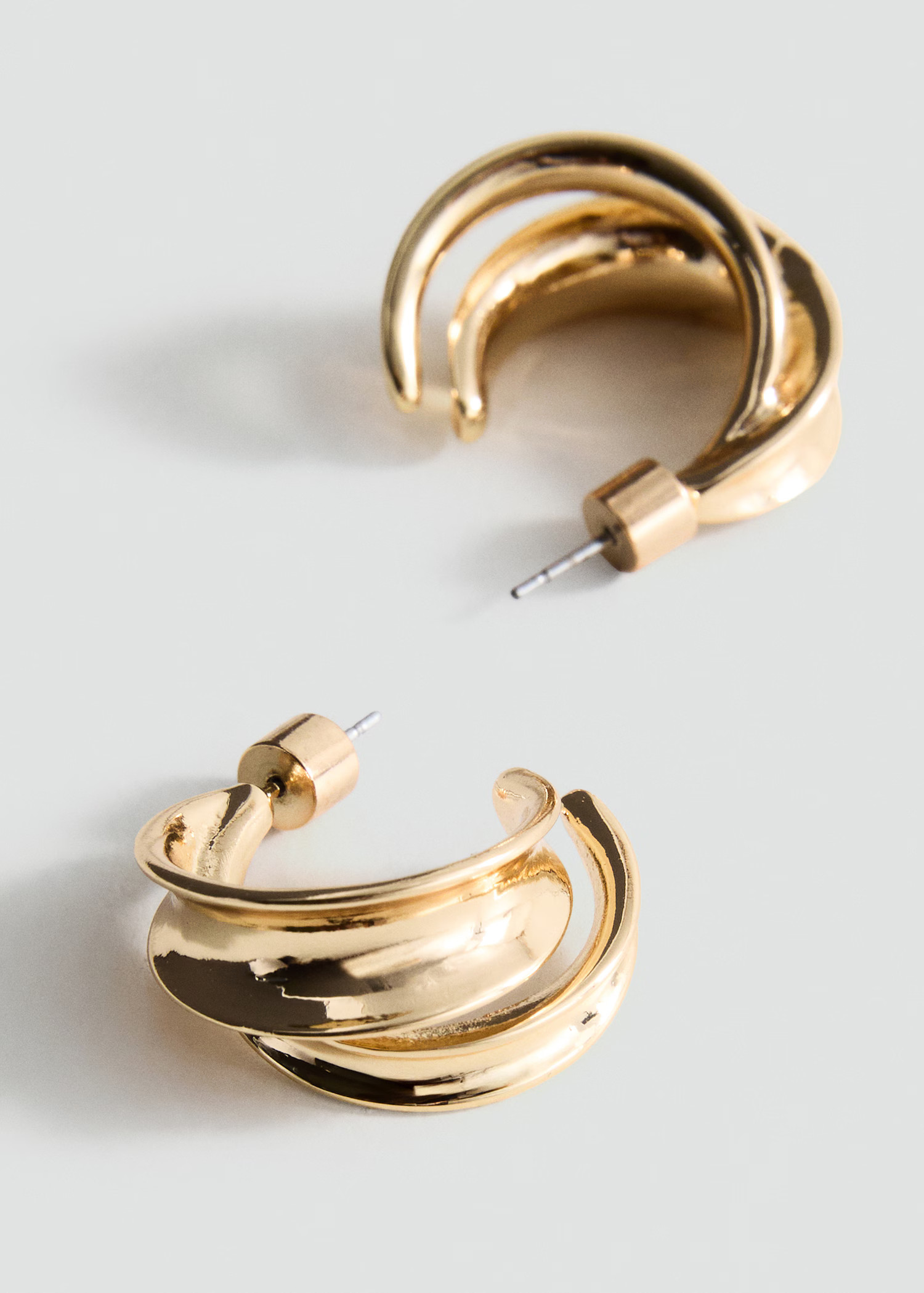 Intertwined hoop earrings - Women | MANGO United Kingdom | MANGO (UK)