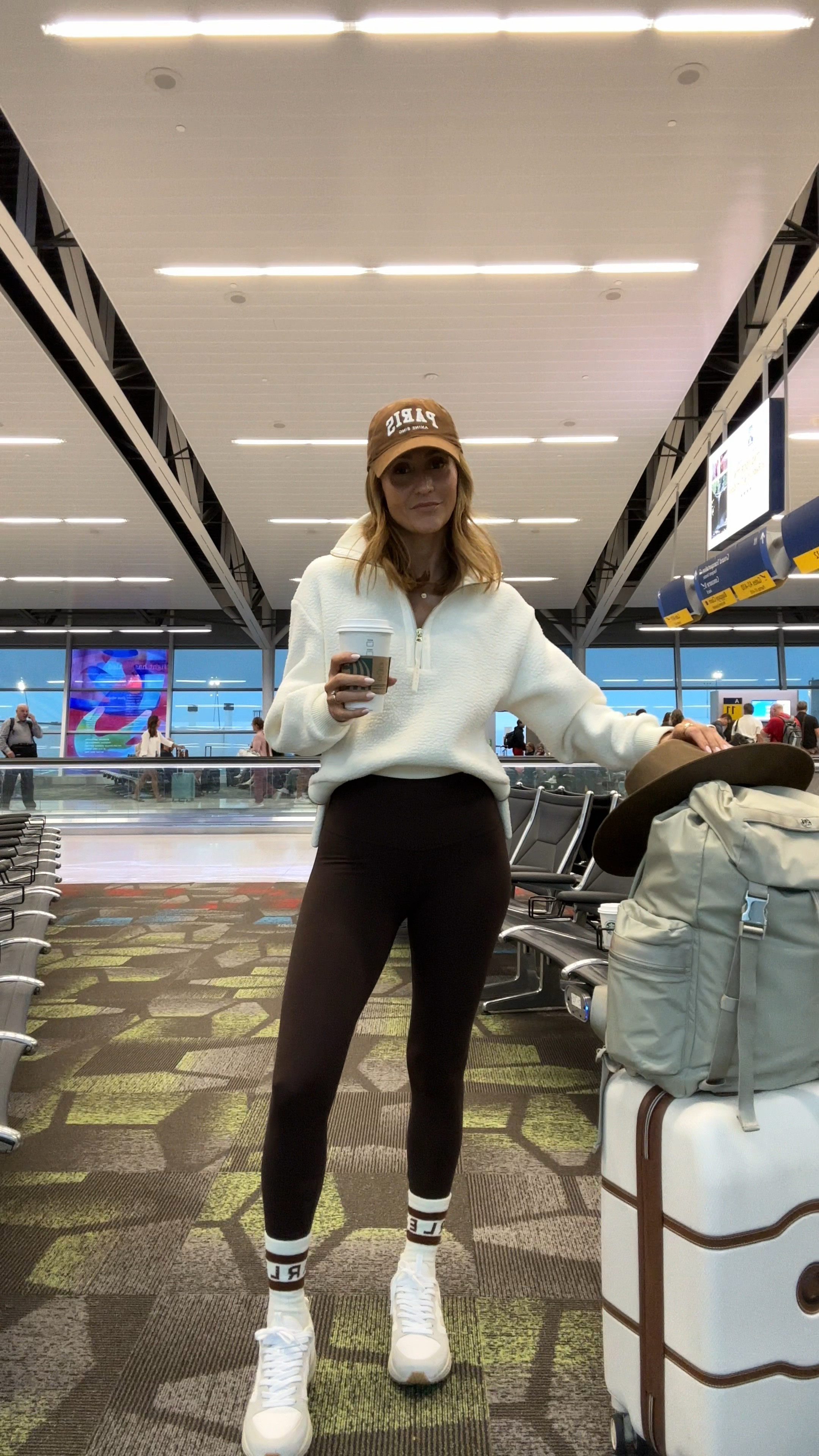 Outfit check - airport outfit - comfiest leggings and cozy fleece. Extra soft fuzzy socks and my favorite color combination! Luggage is Amazon and my companion for many years! 

#LTKshoecrush #LTKstyletip #LTKtravel