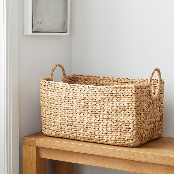 Curved Seagrass Baskets | West Elm (US)