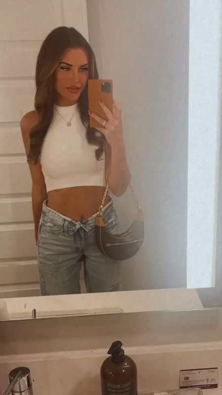 Foldover jeans 
White crop top 
Louis Vuitton Loop Bag
Summer outfit 
Spring outfit 
Denim 
Jeans 
Festival outfit 

#LTKfindsunder50 #LTKfindsunder100 #LTKstyletip