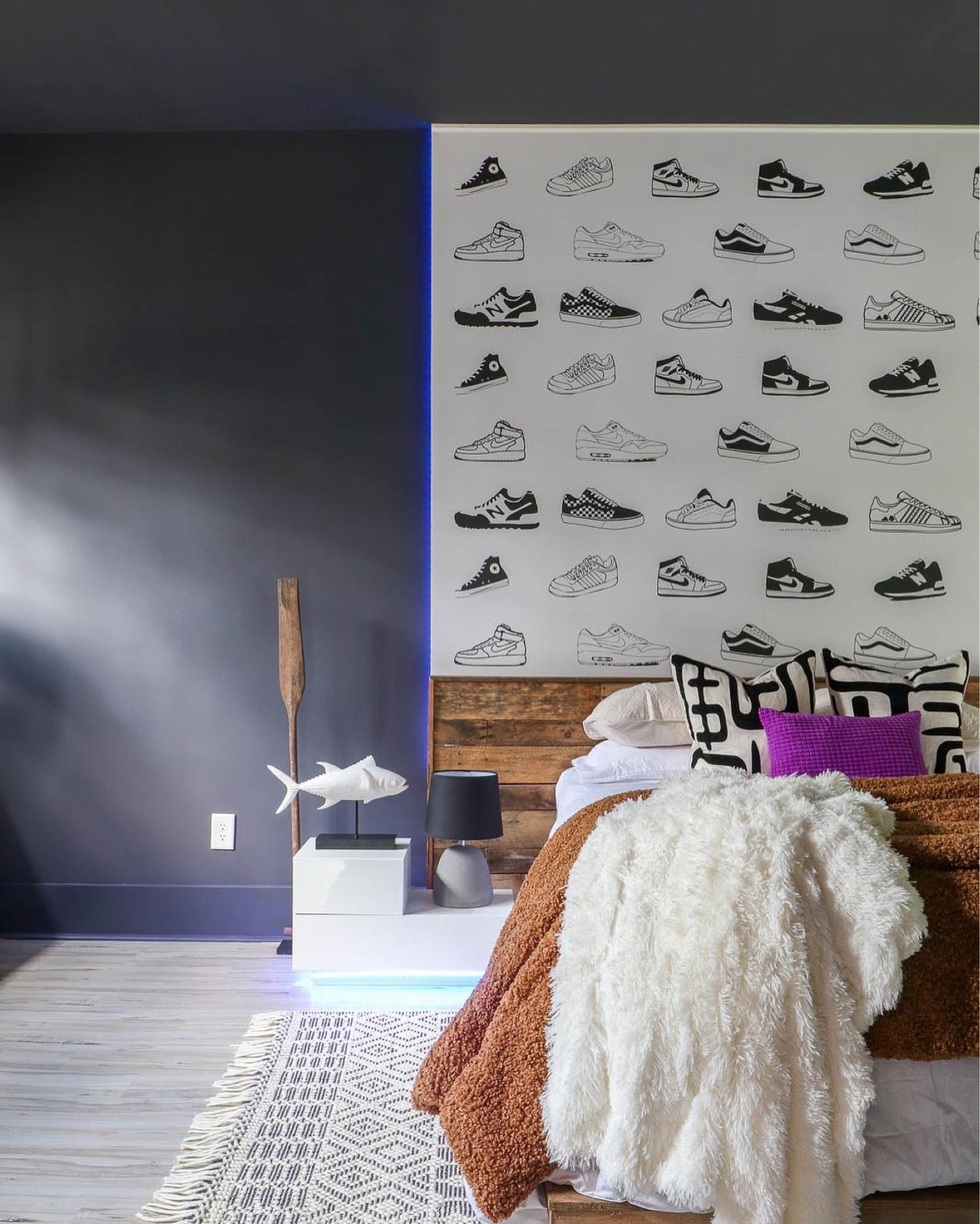 Let’s Chat… First, remember when this was our garage??? Yep, still is… KIND OF 💜 When John and I got married June 2021, we went round and round about where we were going to live… his house, mine, or something new… how we were going to make all of our kids feel at home… wherever home may be. We ended up deciding to make my house our home, but that didn’t come without it’s struggles. We ended up deciding to convert our entire garage into a two bedroom apartment for his teen boys. It took a “minute” but it turned out just perfect 💜 And when I say “struggles”, that also includes where his oldest told me he wanted his room theme to be a combo of a rare purple Nike Jordan sneakers, fishing, and Denver Broncos 🤦🏻‍♀️ The challenge of all design challenges! After his room went a little “viral” recently, I’ve had so many questions about his sneaker mural! I got his wallpaper mural from Society 6 but unfortunately, it looks like it’s sold out now. They do have others though! I’ve linked the rest of his room details right here… 

#LTKfamily #LTKhome #LTKkids