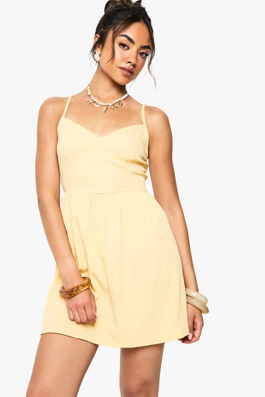 Lemon Textured Crinkle Strappy Mini Dress | Boohoo | Boohoo.com (UK & IE)