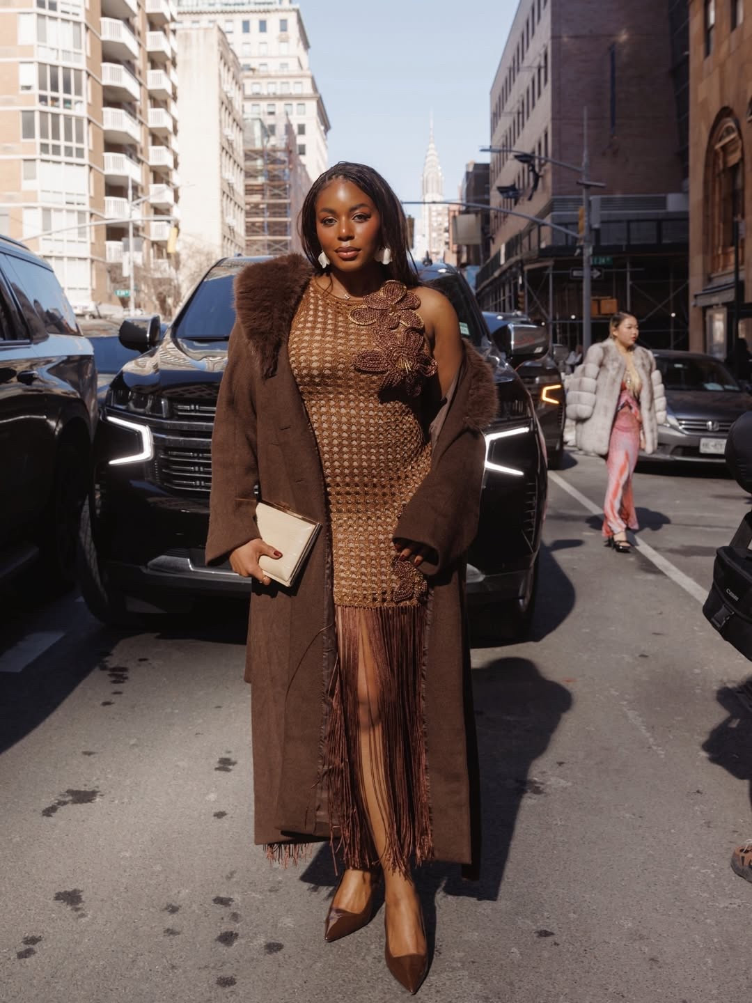 Winter to spring transition outfit for your next night out. Textured mini dress with an opulent faux fur coat accessorized with brown heels and a gold clutch .. For more links to date night outfits, work outfits, vacation outfits beach, easter basket stuffers, spring outfits, resort wear 2026, business casual workwear, rodeo outfit inspo, winter denim, follow me on LTK! ✨

#LTKspringtrends #LTKSeasonal #LTKgrwm