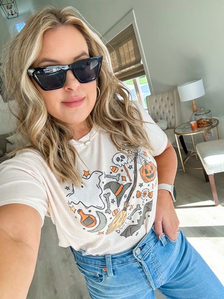 Soft and stretchy Halloween graphic tee from Amazon and black sunnies from Walmart. Halloween outfit. Fall outfit 

#LTKSeasonal #LTKHalloween