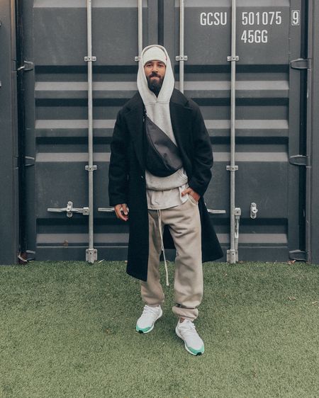 ESSENTIALS hoodie in ‘Heather Grey’ (size M) and sweatpants in ‘Smoke’ (size M). FEAR OF GOD t-shirt in ‘Taupe’ (size M). ADIDAS ULTRABOOST 1.0 DNA RUNNING SPORTSWEAR LIFESTYLE SHOES in ‘Cloud White and Green’ (size 9.5US). THE ROW Slouchy Banana Bag in ‘Black’. A relaxed and elevated men’s look for a winter night out. 

#LTKmens #LTKstyletip #LTKfit