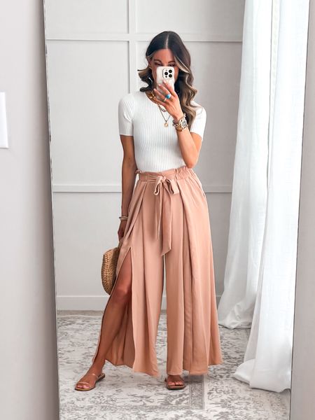 These wide leg pants have the prettiest movement when in motion! Dress them up or down! I’m wearing a size small. Fits true to size. 

#vacationoutfit #springoutfit #summeroutfit #datenightoutfit

#LTKfindsunder100 #LTKfindsunder50 #LTKstyletip