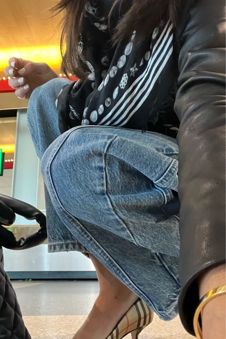 Fit Check at the Airport
Everyone needs a leather jacket. I wore mine all week and home today with my barrel jeans, plaid heels, and tissue scarf