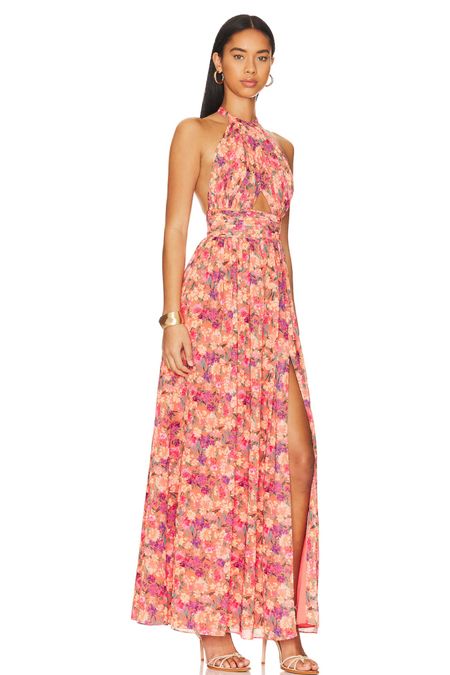 This maxi floral dress with cutouts and a slit makes this dress perfect for a destination wedding or as a spring wedding guest dress!

#LTKwedding