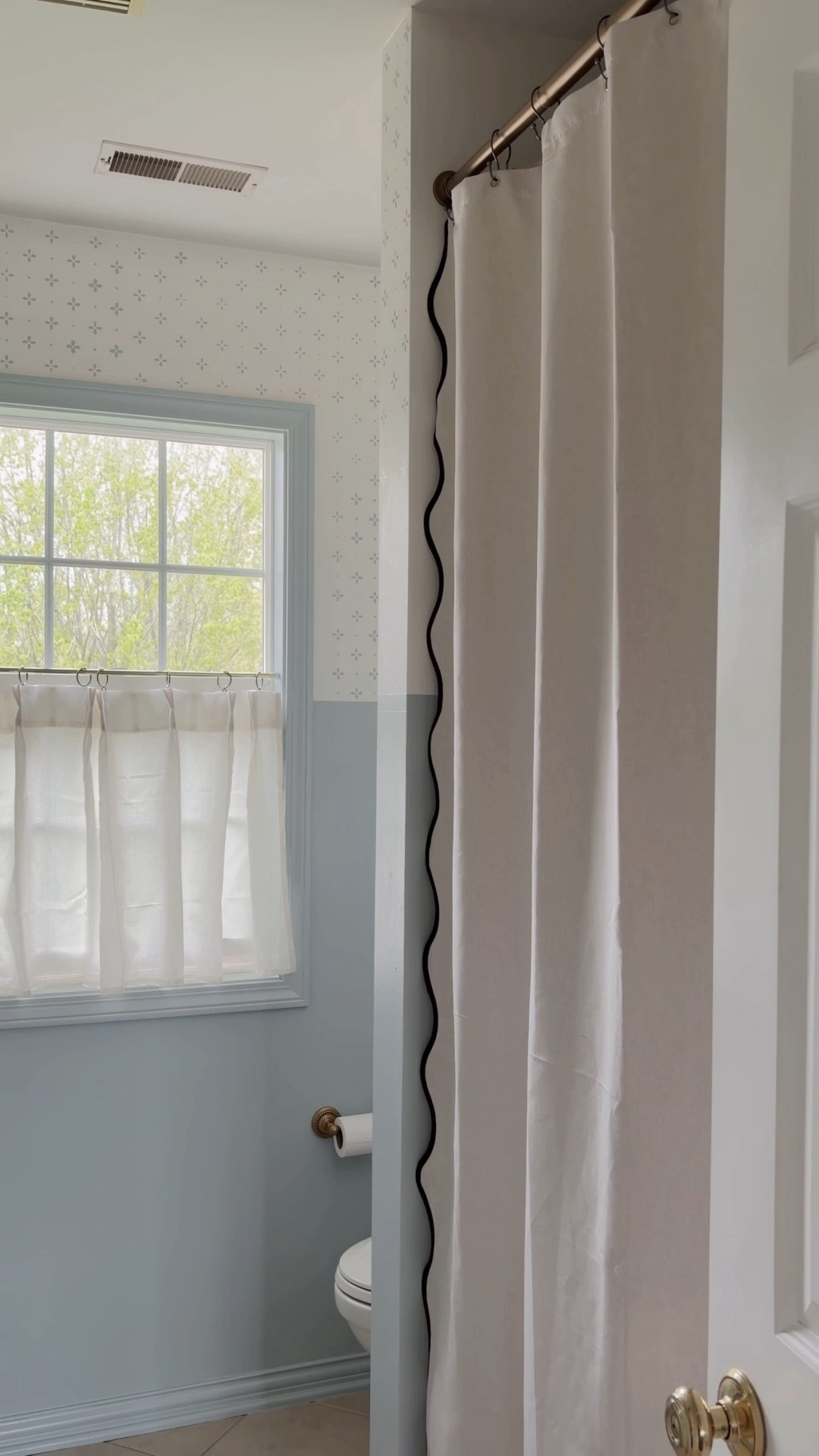 I seriously just created a reel about a shower curtain. Instagram makes you do weird things  
Comment shop and I’ll send you the links to everything

The kids bathroom is just about done! More to come…even though you’re seeing a lot of it right now 

I could not wait to get rid of that old nasty shower curtain rod and replace it with a new one. It’s been on my to do list for a good 8 years. 

I told my husband, it was one of the happiest days of my life. And I don’t think I was being dramatic.

My new favorite home hack is to hang your shower curtains high like you do your window curtains. 

I’ll link the shower curtain and a few other extra long ones for you!

Bathroom, decorating ideas extra long, shower, curtains, bathroom decor, bathroom makeover