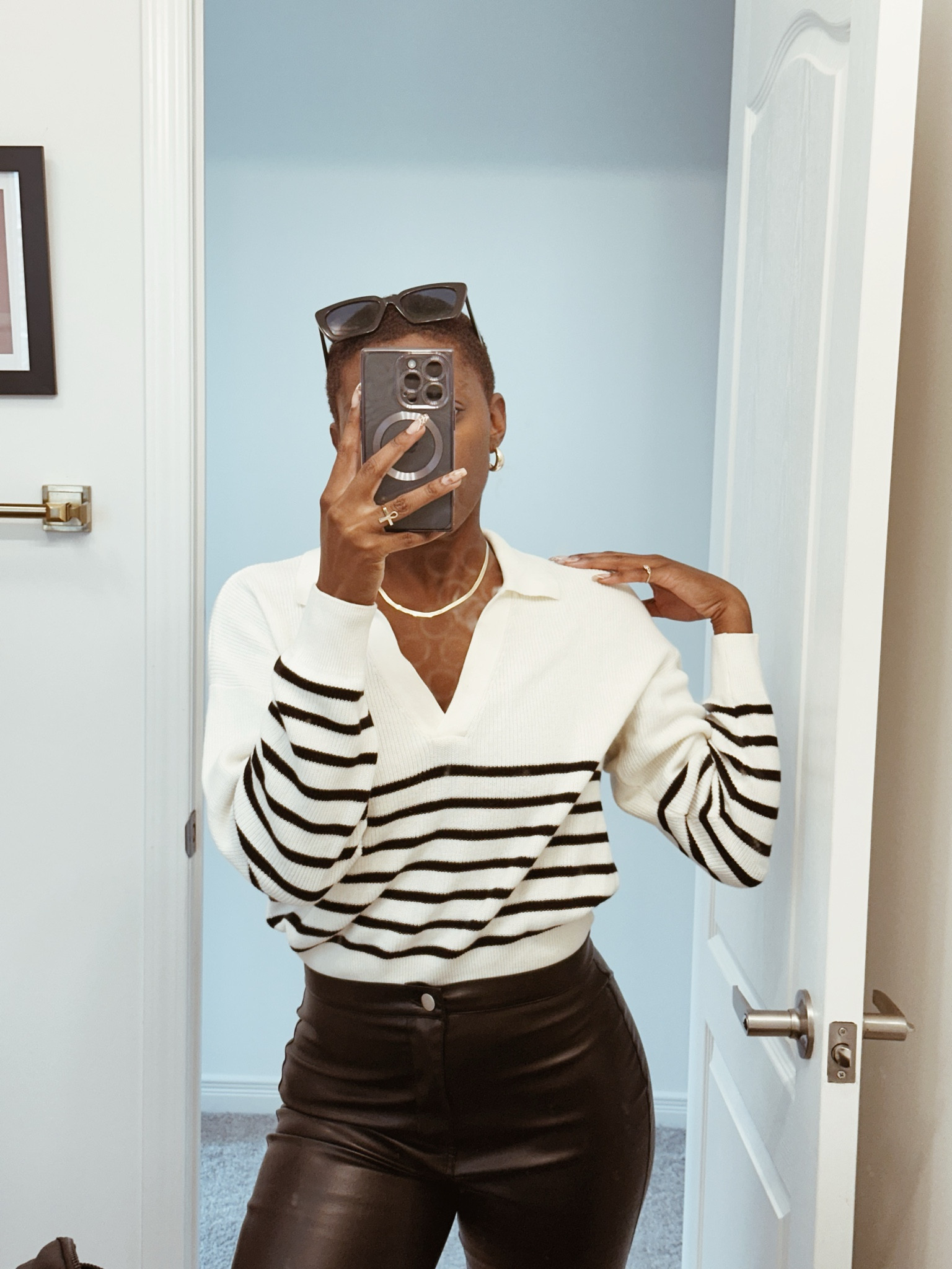 Ardene has such cute finds and I feel like they’re so looked over! A beige sweater with black stripes is so trendy for fall fashion. I paired it with leather pants, my lululemon crossover puff bag & this puffer vest. And of course I had to wear my favourite black platform Uggs 🖤

#LTKSeasonal #LTKstyletip #LTKGiftGuide