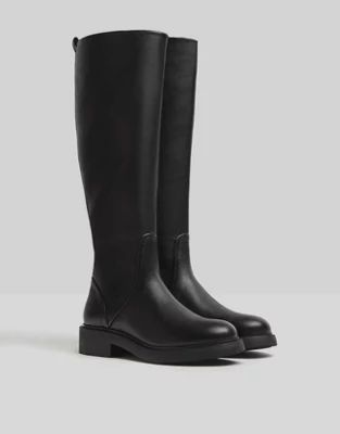 Bershka knee high flat boot in black | ASOS (Global)