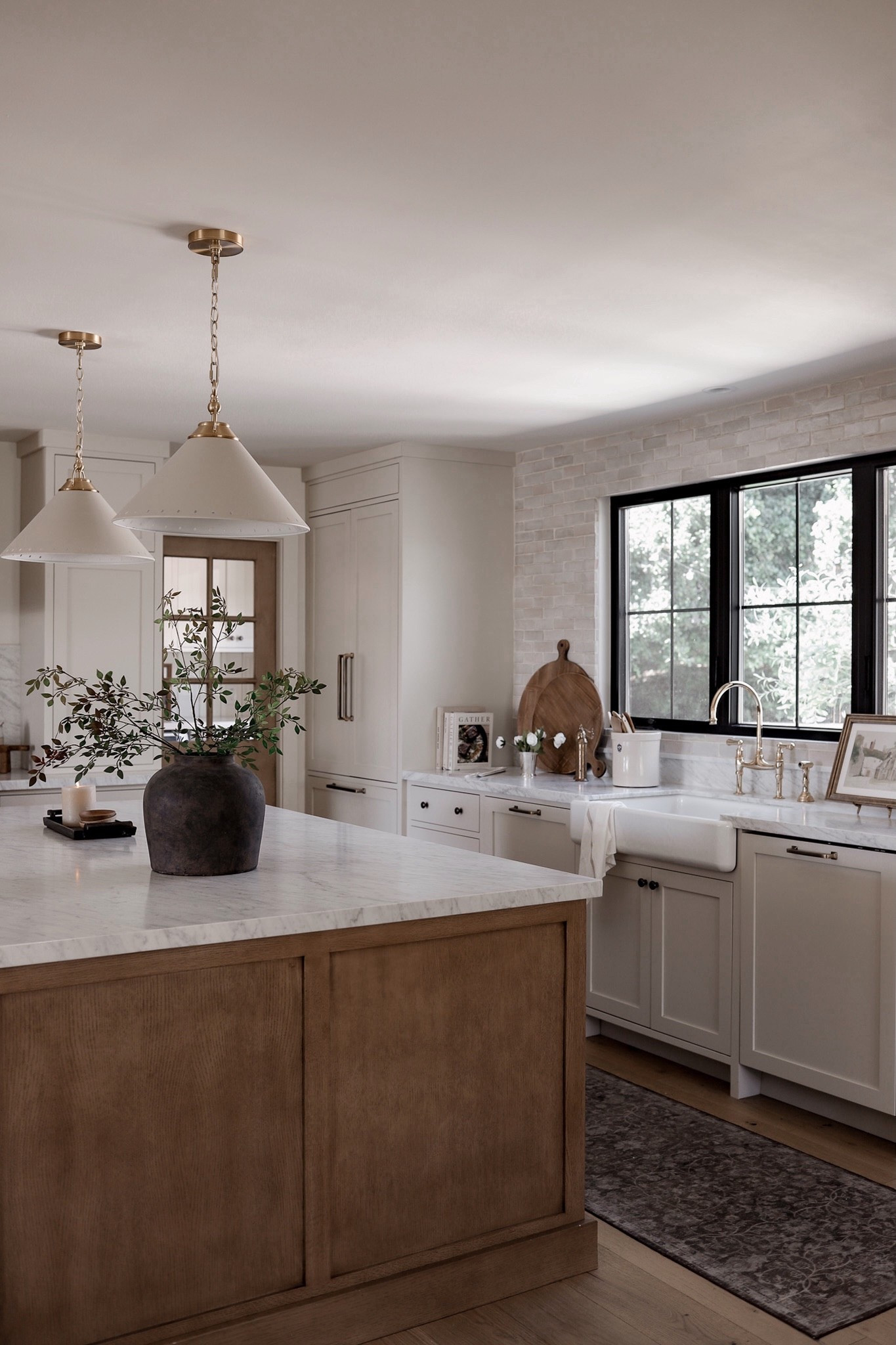 Shop our kitchen! Paint is Benjamin Moore Swiss Coffee on the walls and ceilings. Benjamin Moore Natural Cream on cabinets. White oak is a custom stain. Tile is Natural Zellige from Riad Tile. Linked the Zellige from Bedrosians which is the same! 🤍 

#LTKSeasonal #LTKHome