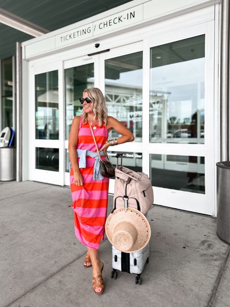 Headed home in this comfy t-shirt dress (code SUGARPLUM10 🥳!). Linking all my travel essentials for carry-on life! 

#LTKover40 #LTKtravel