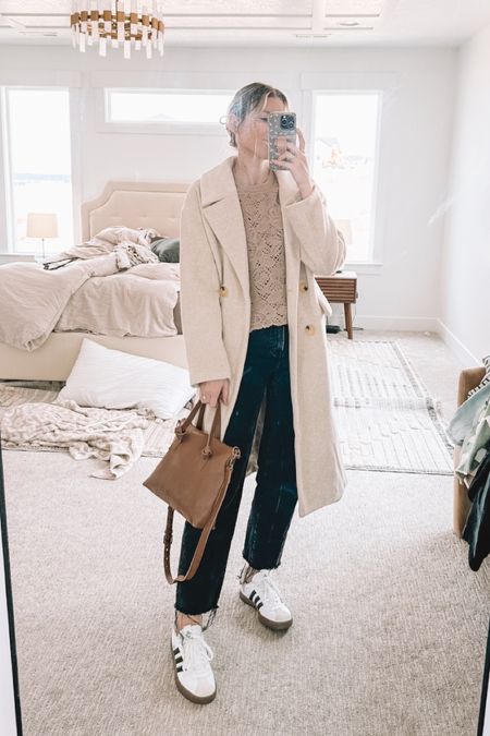 Spring outfit but I added a neutral coat because it’s raining today! These sneakers look almost identical to sambas but they’re half the price! Forever loving this crossbody purse - it’s the perfect size for a diaper, wipes and the other few things I need and this Abercrombie crochet top comes in lots of colors too!

#LTKSeasonal #LTKstyletip #LTKshoecrush