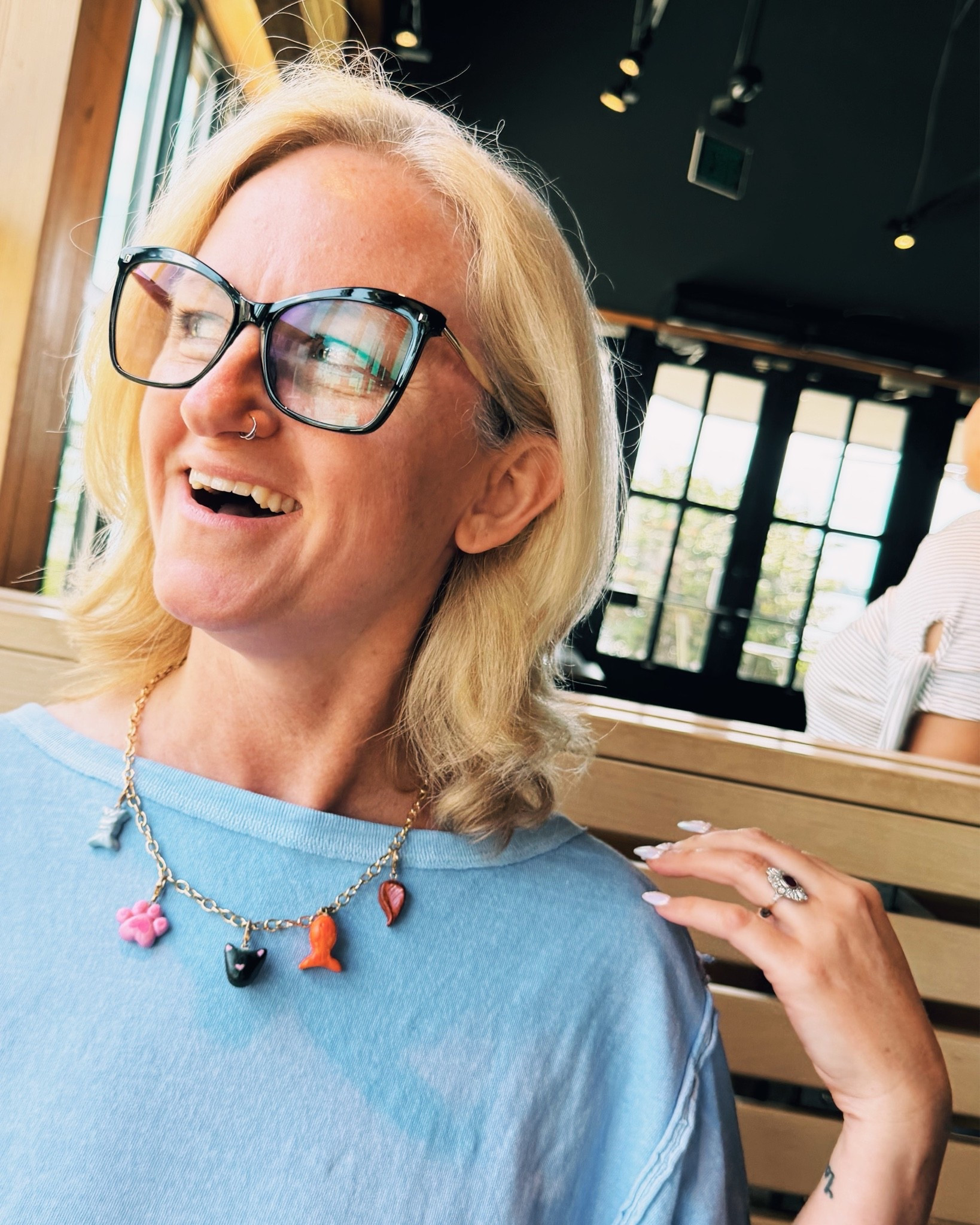 Movie Theater double feature + Shake Shack for lunch. 🎞️🍔  Proudly wearing my favorite handmade necklace w/ my matching go-to Free People tee. 🐾🩵

#LTKdayinmylife #LTKootd #LTKOver40